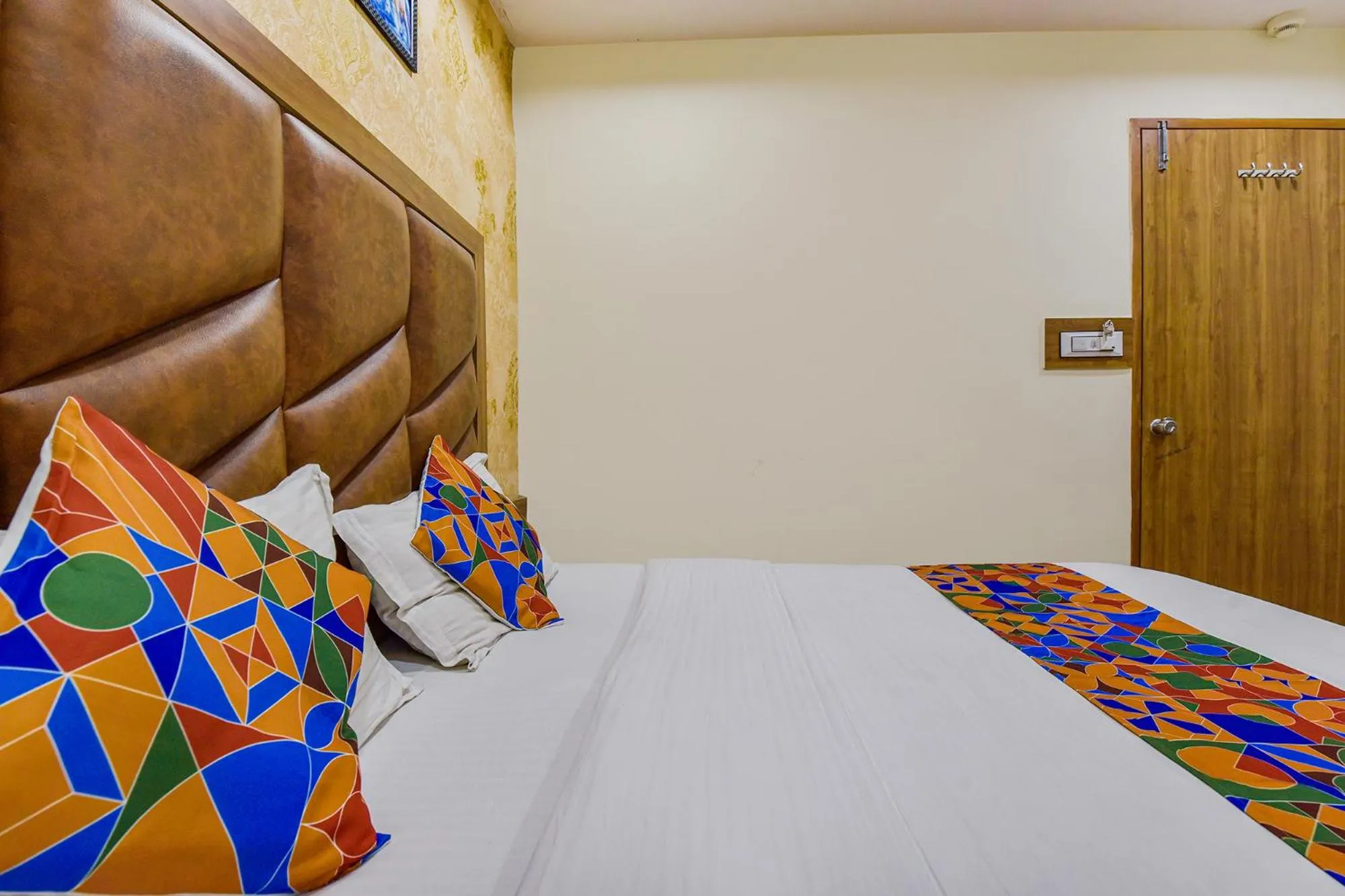 Bed in FabHotel Silver Inn