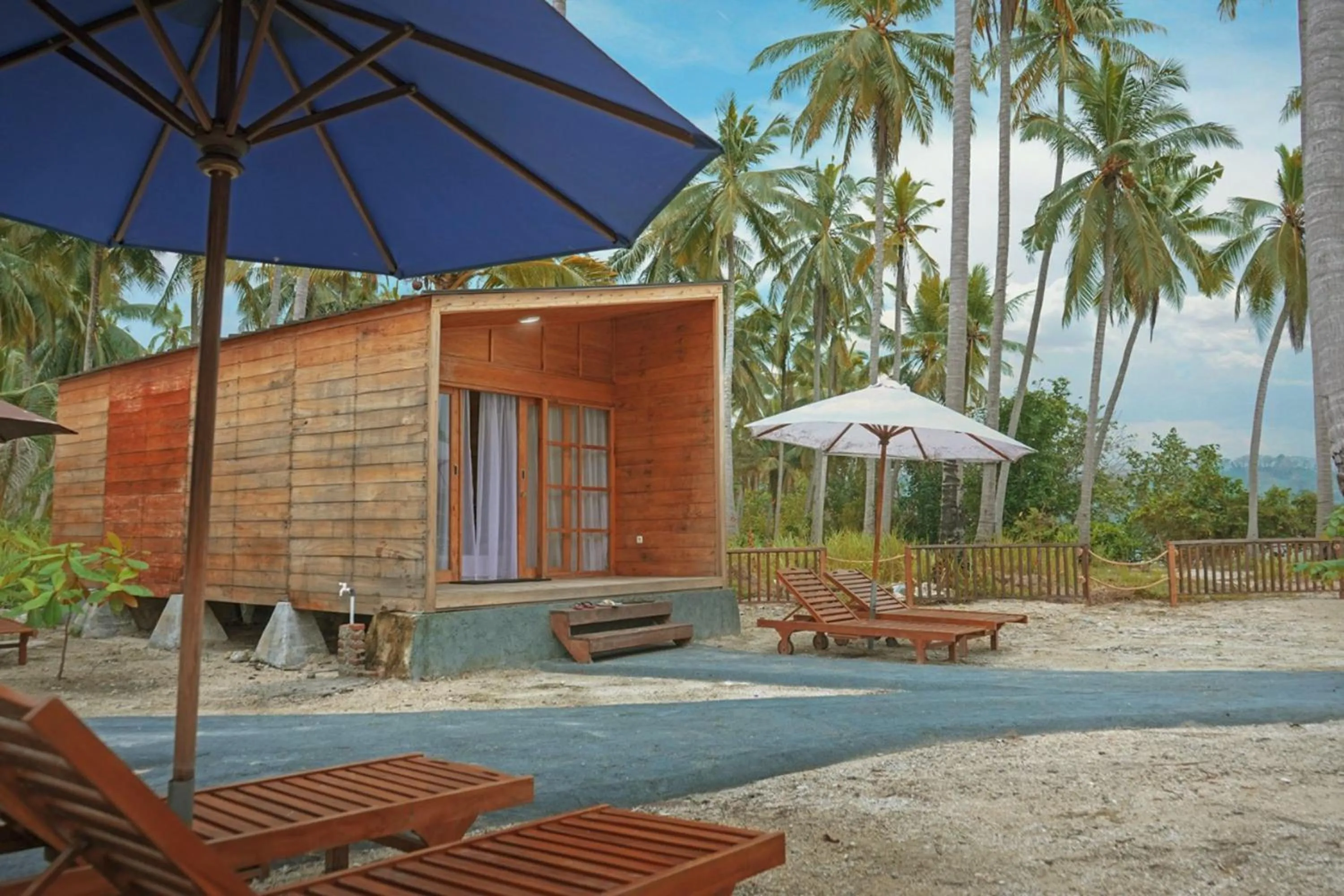 Property building in Pulau Mahitam Resort & Cottage by Hotelku