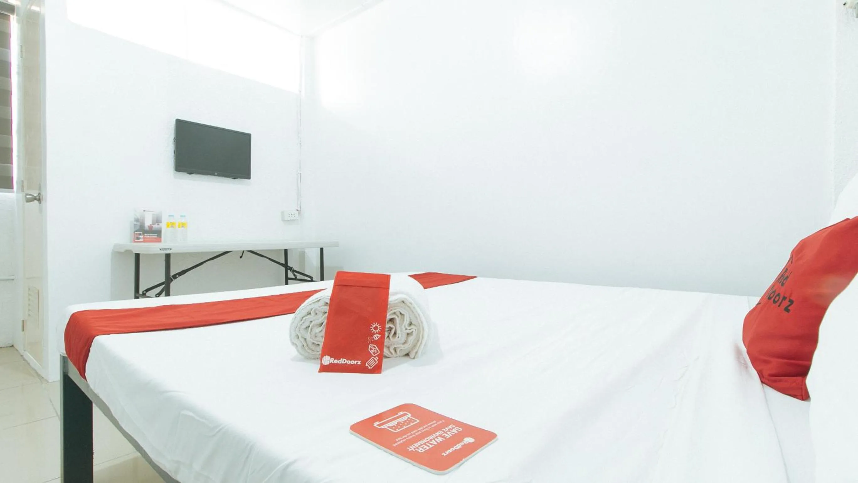 TV and multimedia, Bed in RedDoorz @ Shukran Rentals OPC Pampanga
