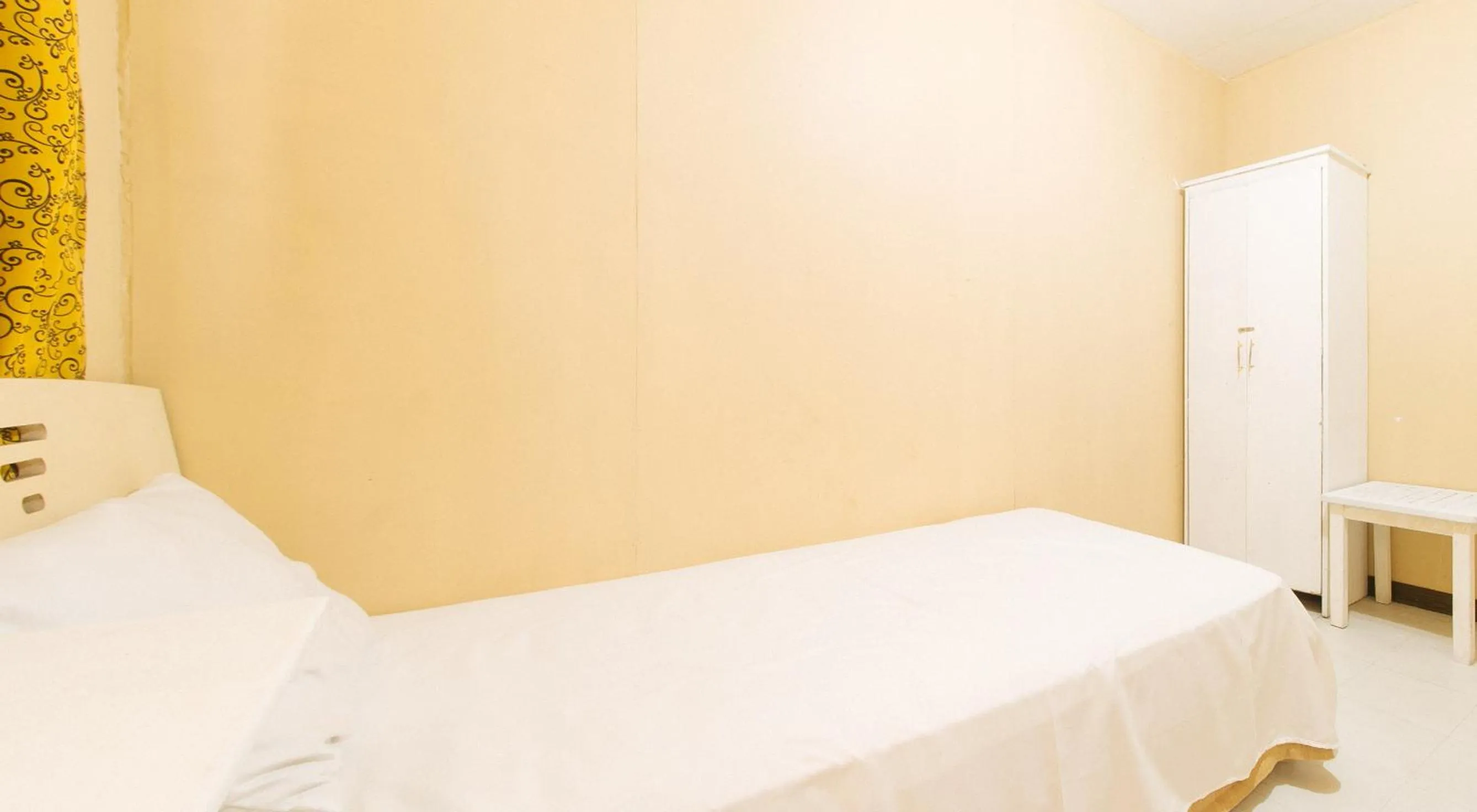 Bed in Cristian Jay Dormitory by RedDoorz