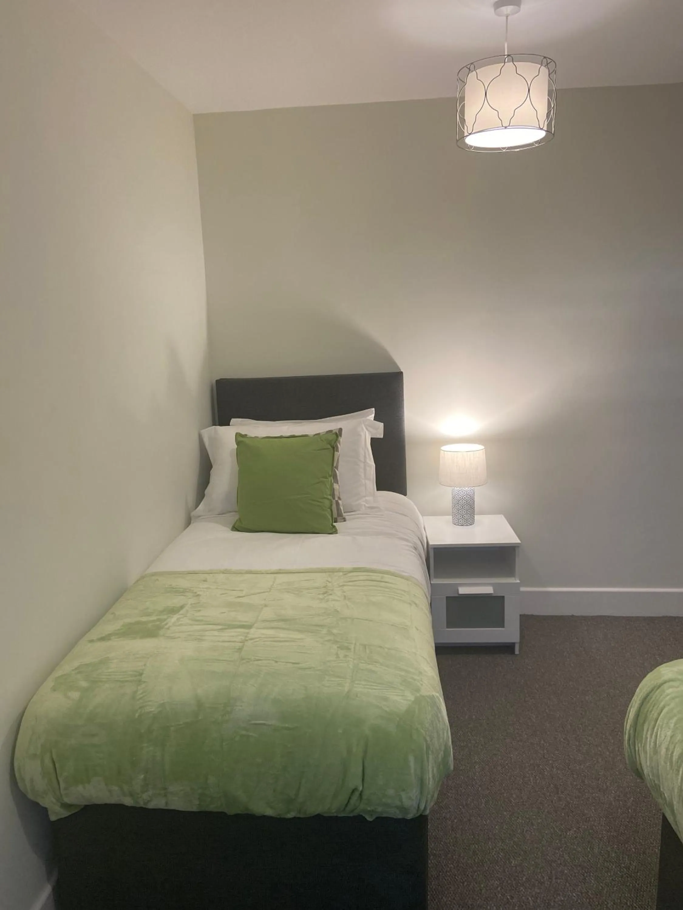 Bedroom in Gladstone Apartments by Bluebell Rooms