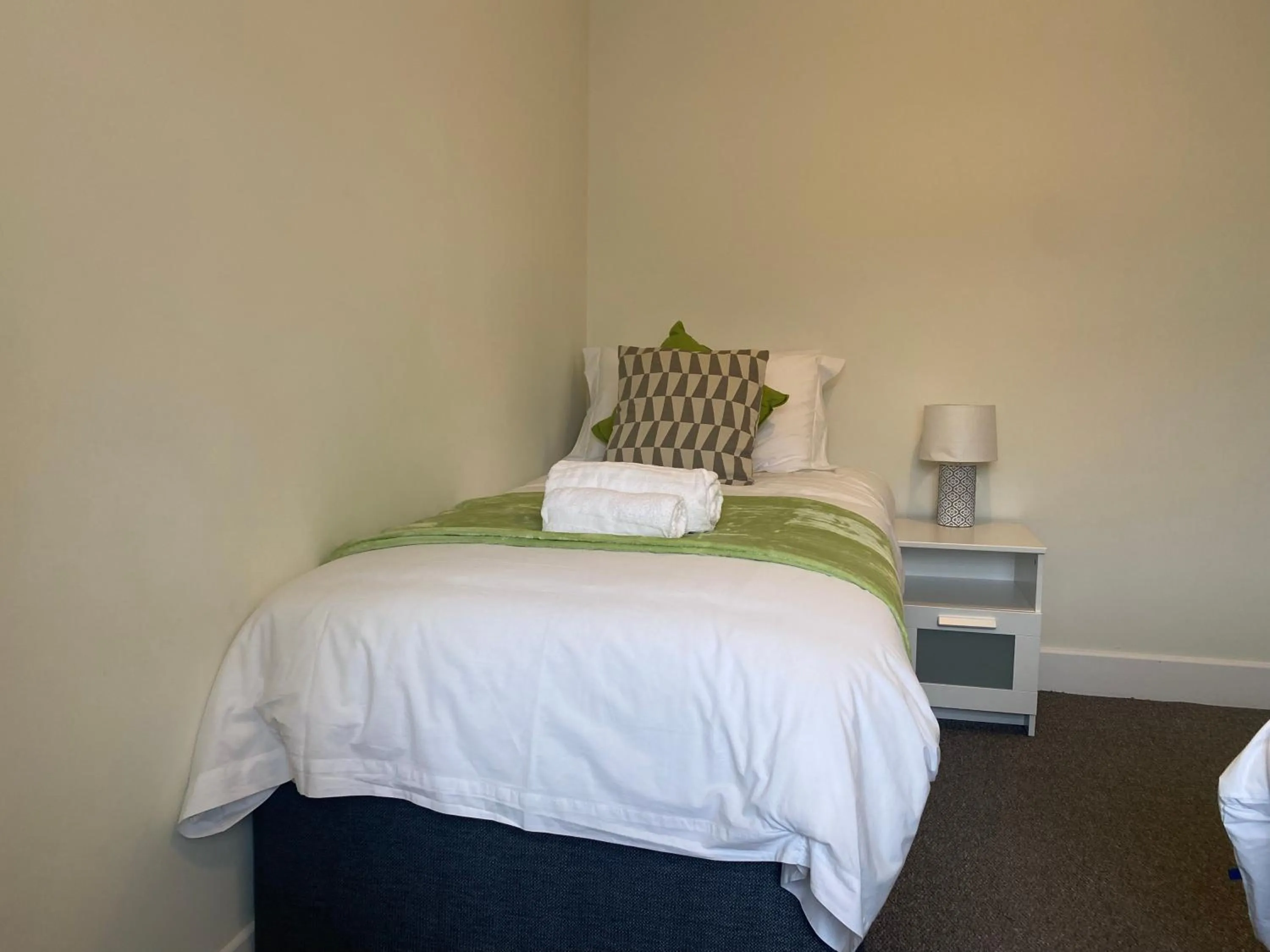 Bedroom in Gladstone Apartments by Bluebell Rooms