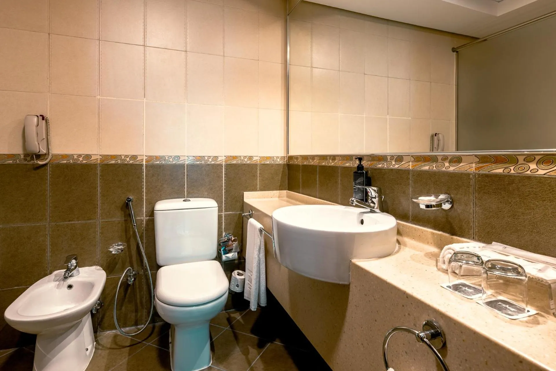 Bathroom in TIME Oak Hotel & Suites