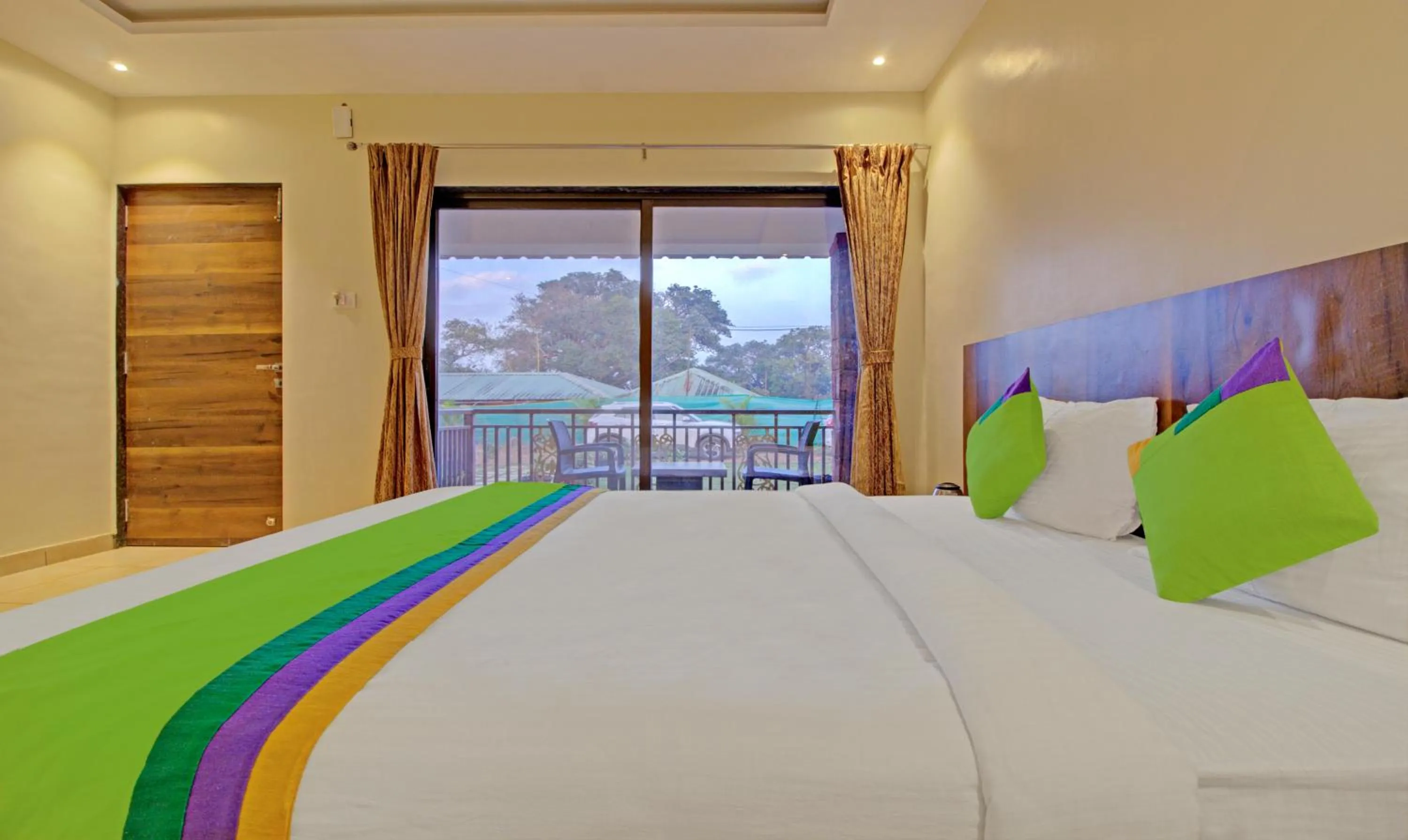 Bedroom, Bed in Treebo Nakshatra Cottages Mahabaleshwar