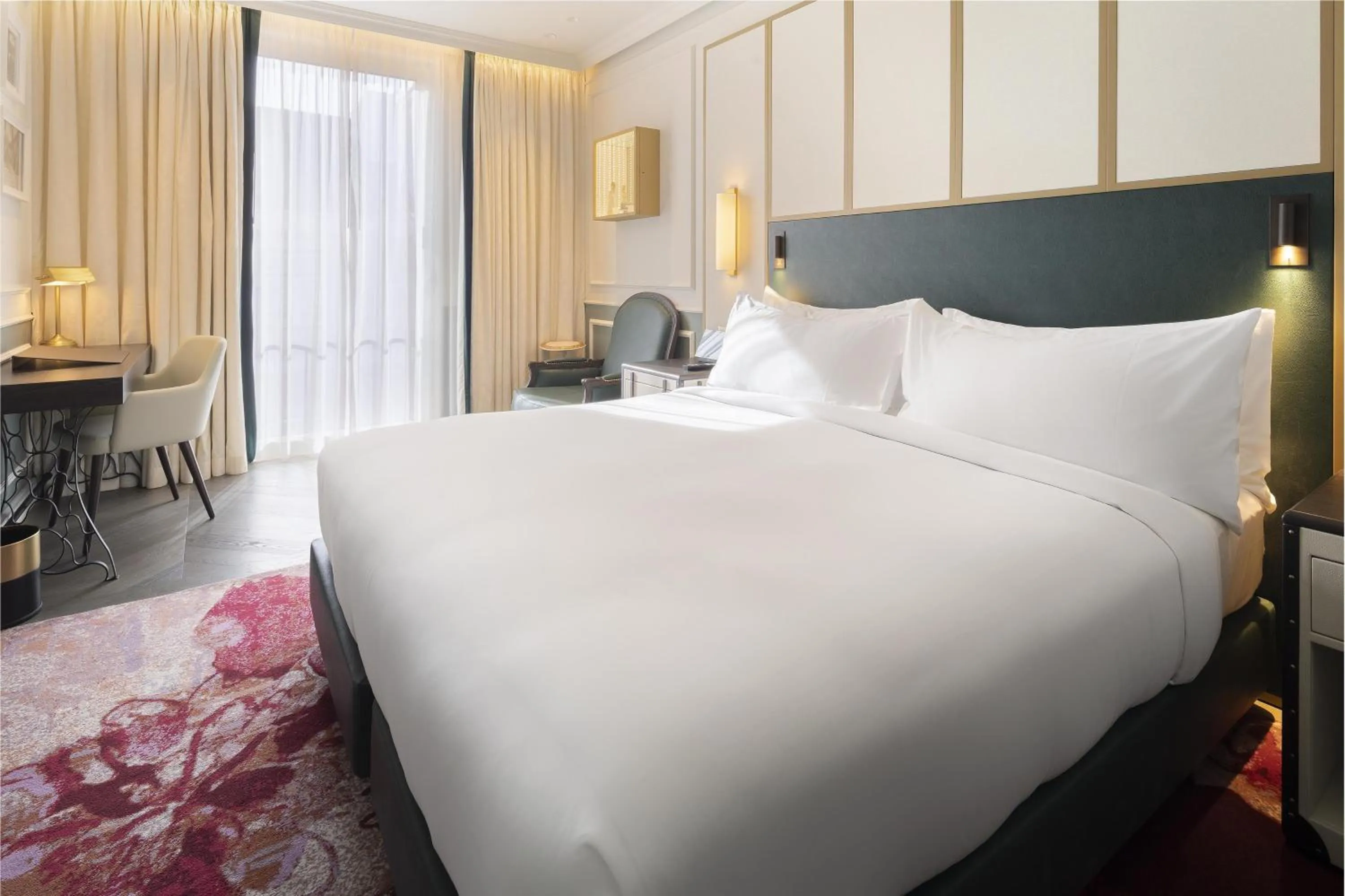 Bed in The Emerald House Lisbon - Curio Collection By Hilton