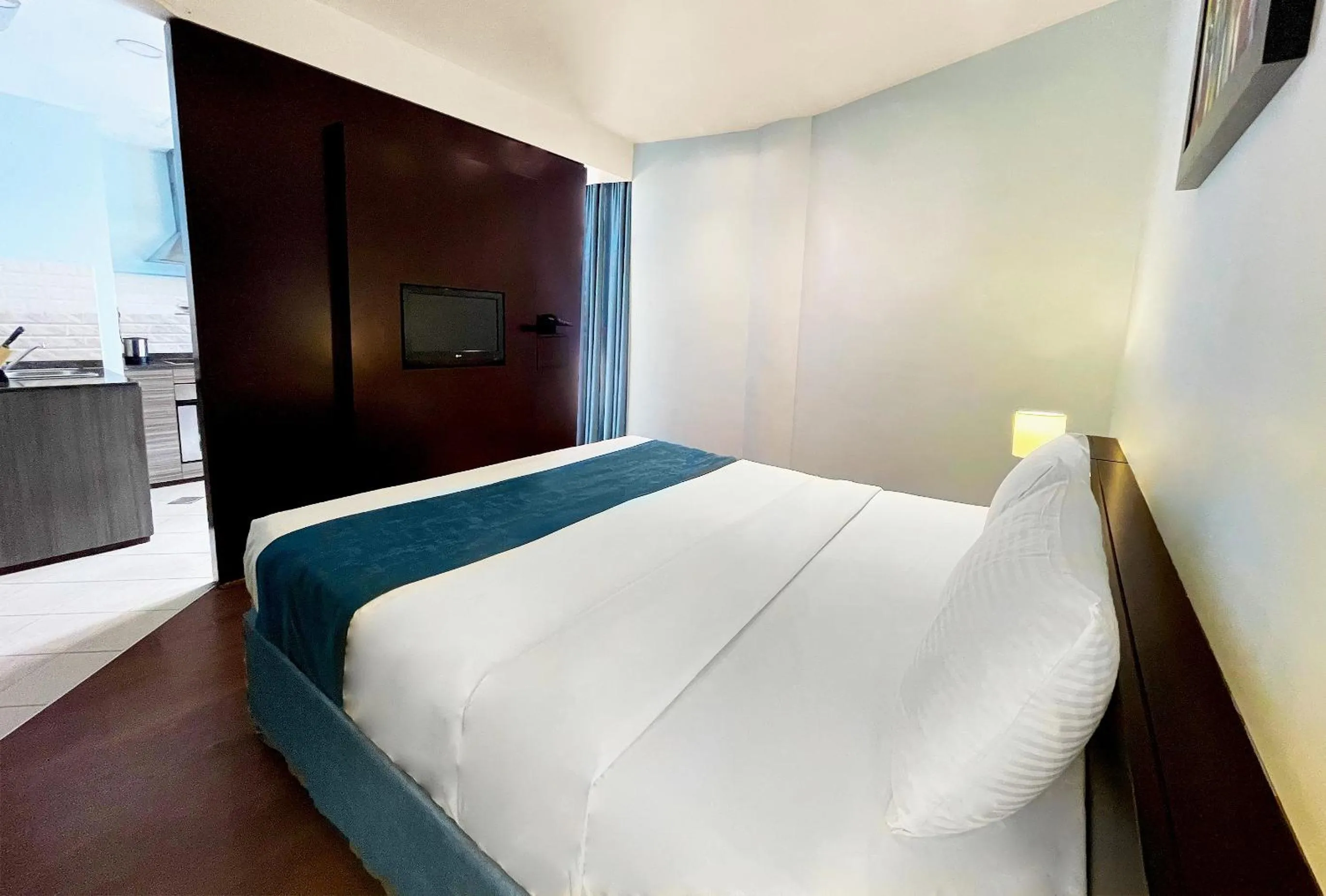 Bed in Signature Hotel Apartments and Spa