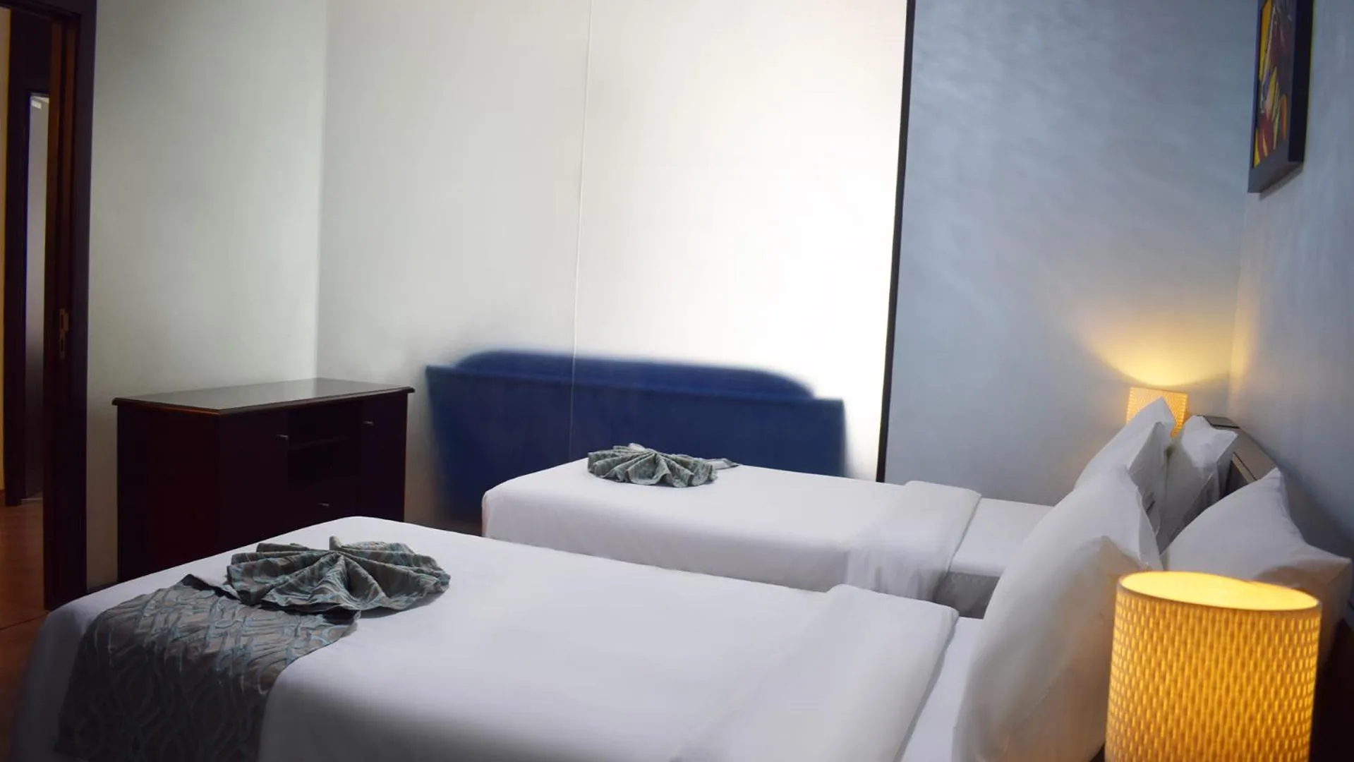 Bed in Signature Hotel Apartments and Spa