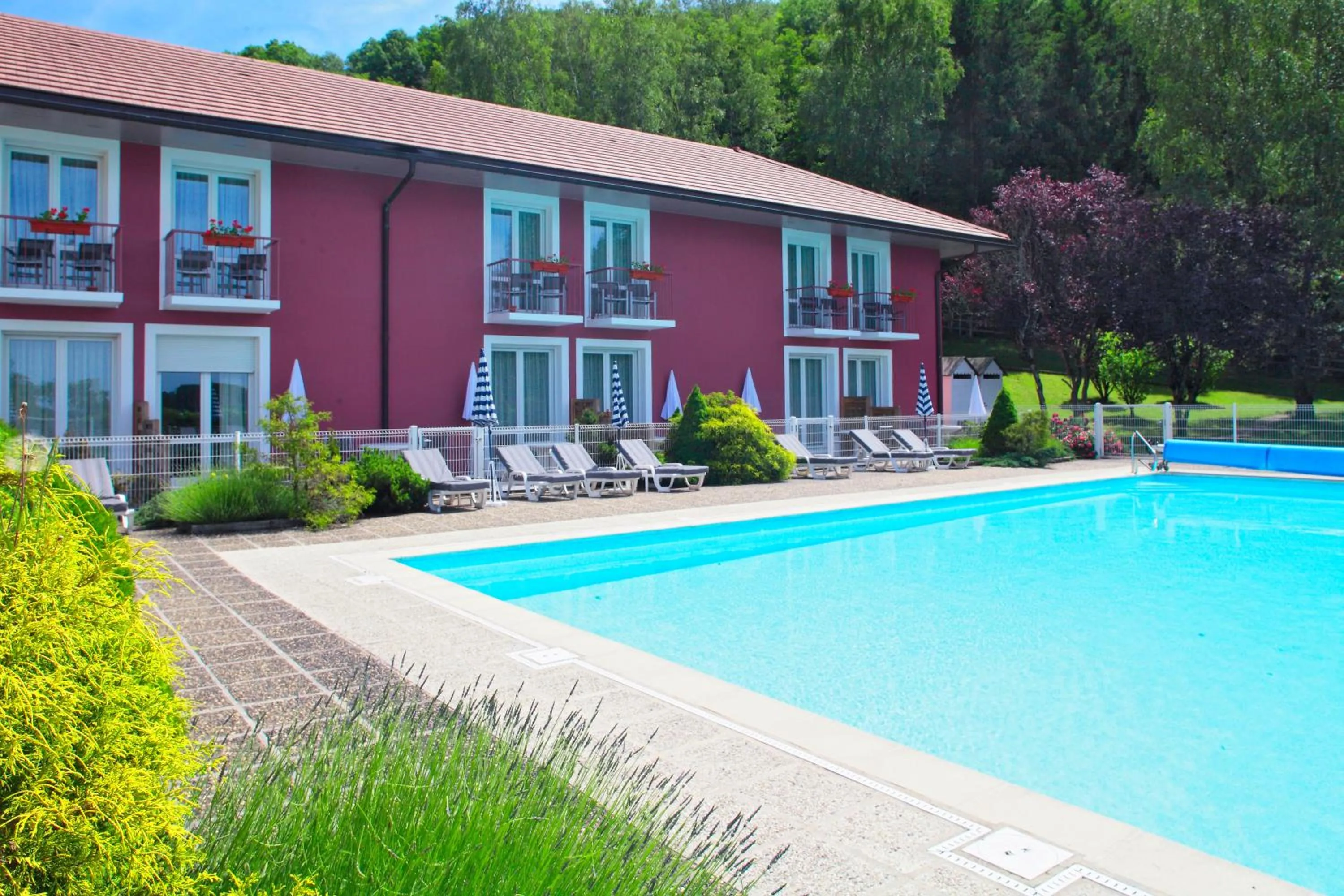 Swimming pool in Domaine du Revermont - Logis Hotel