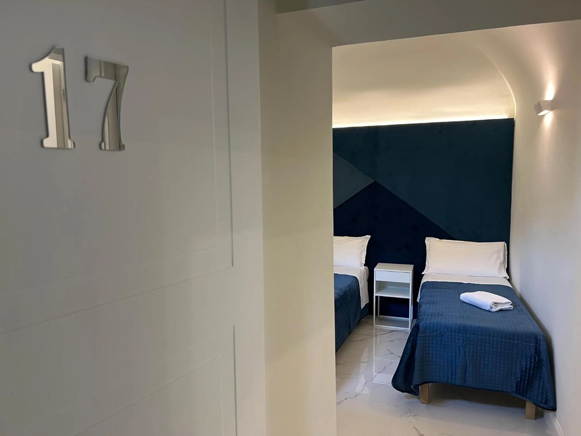 Bed in Motta Palace Apartments & Rooms