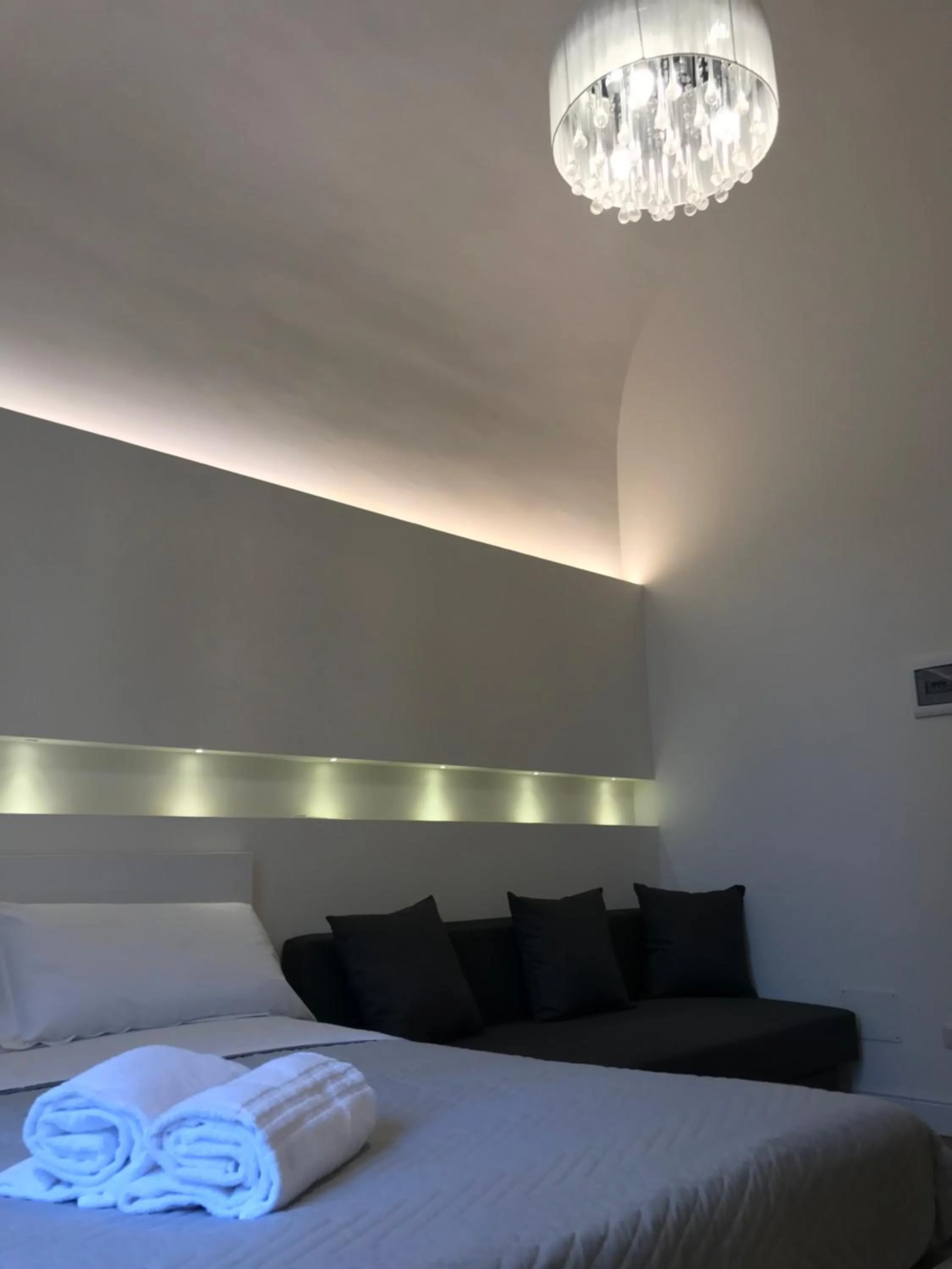 Bed in Motta Palace Apartments & Rooms