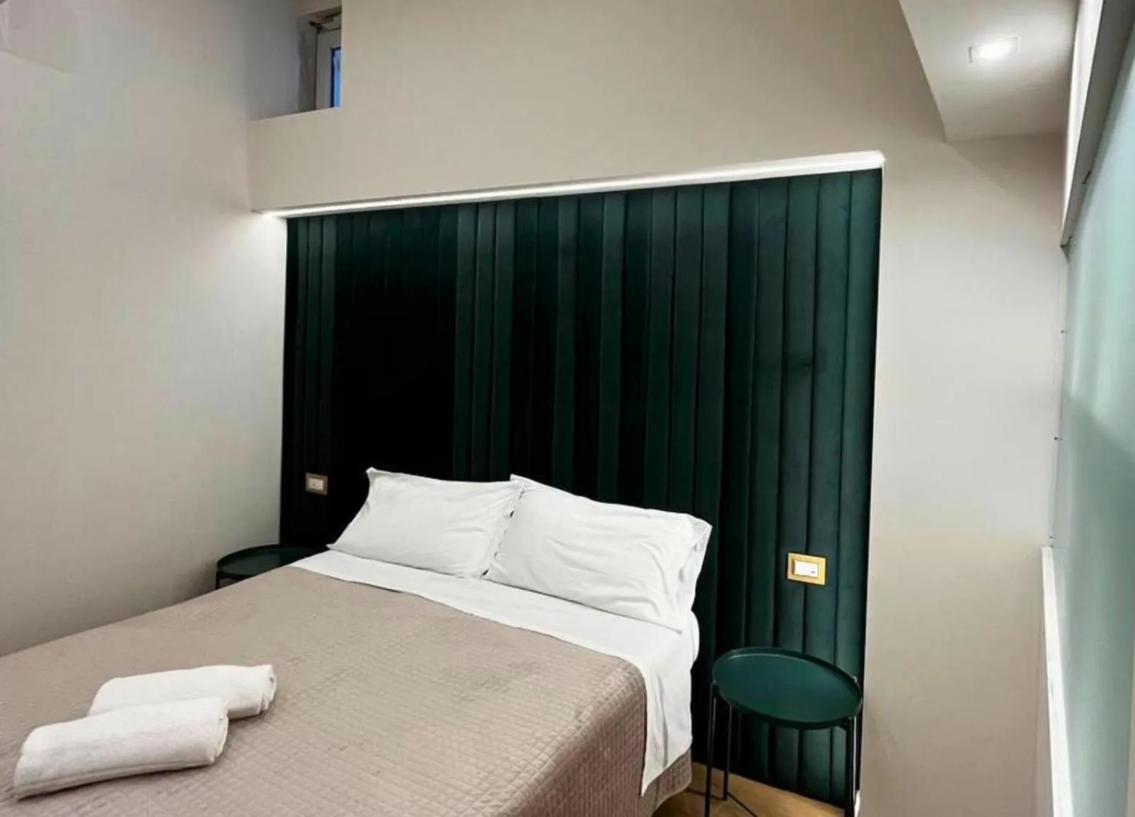 Bed in Motta Palace Apartments & Rooms