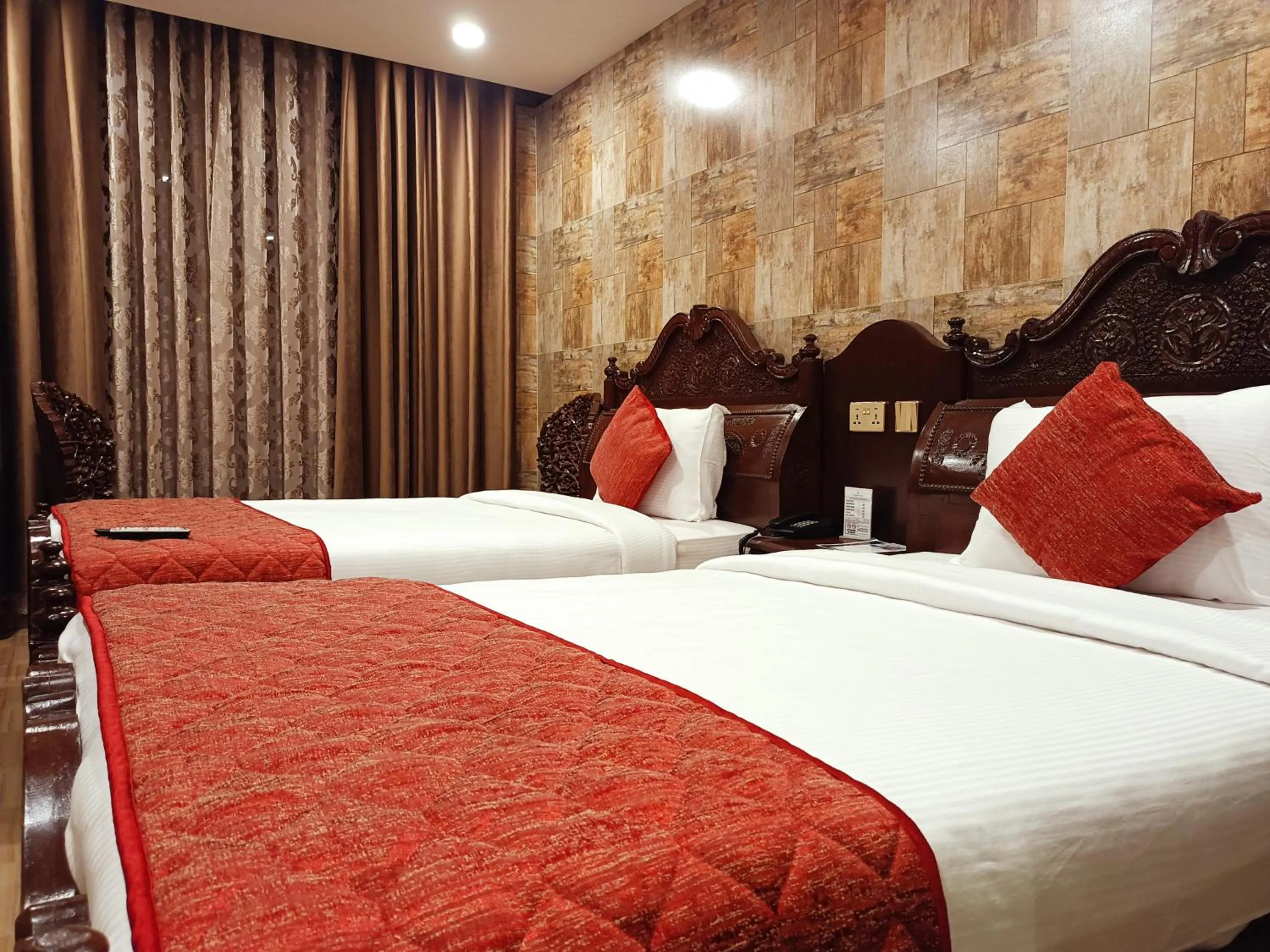 Bed in HYDERS PARK- THE LUXURY HOTEL