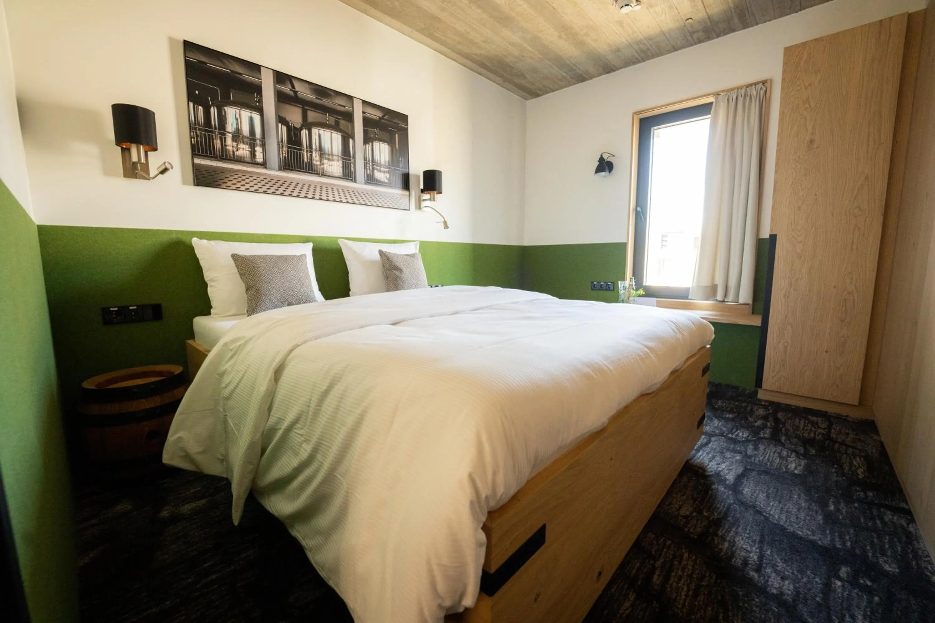 Bed in De Brauhotel - Hôtel de la Brasserie Nationale