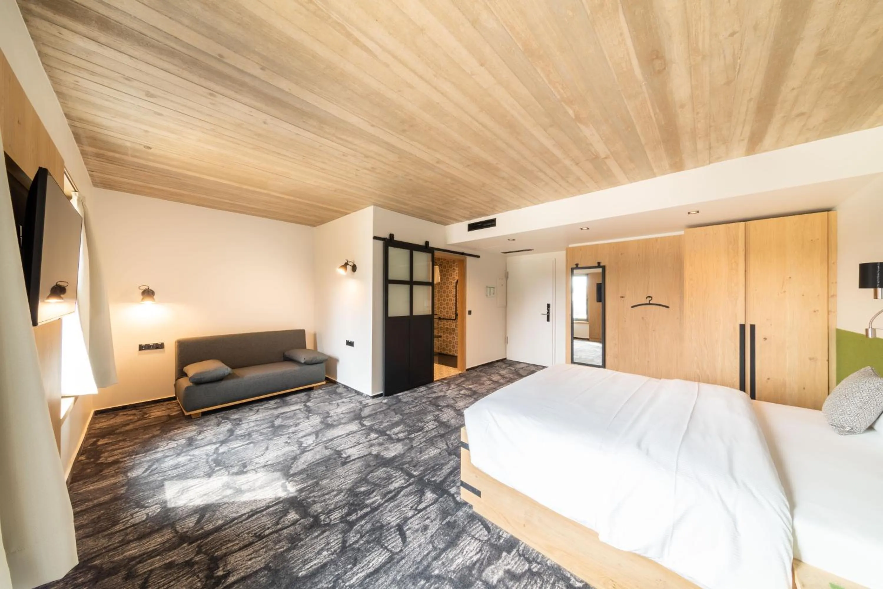 Bed in De Brauhotel - Hôtel de la Brasserie Nationale