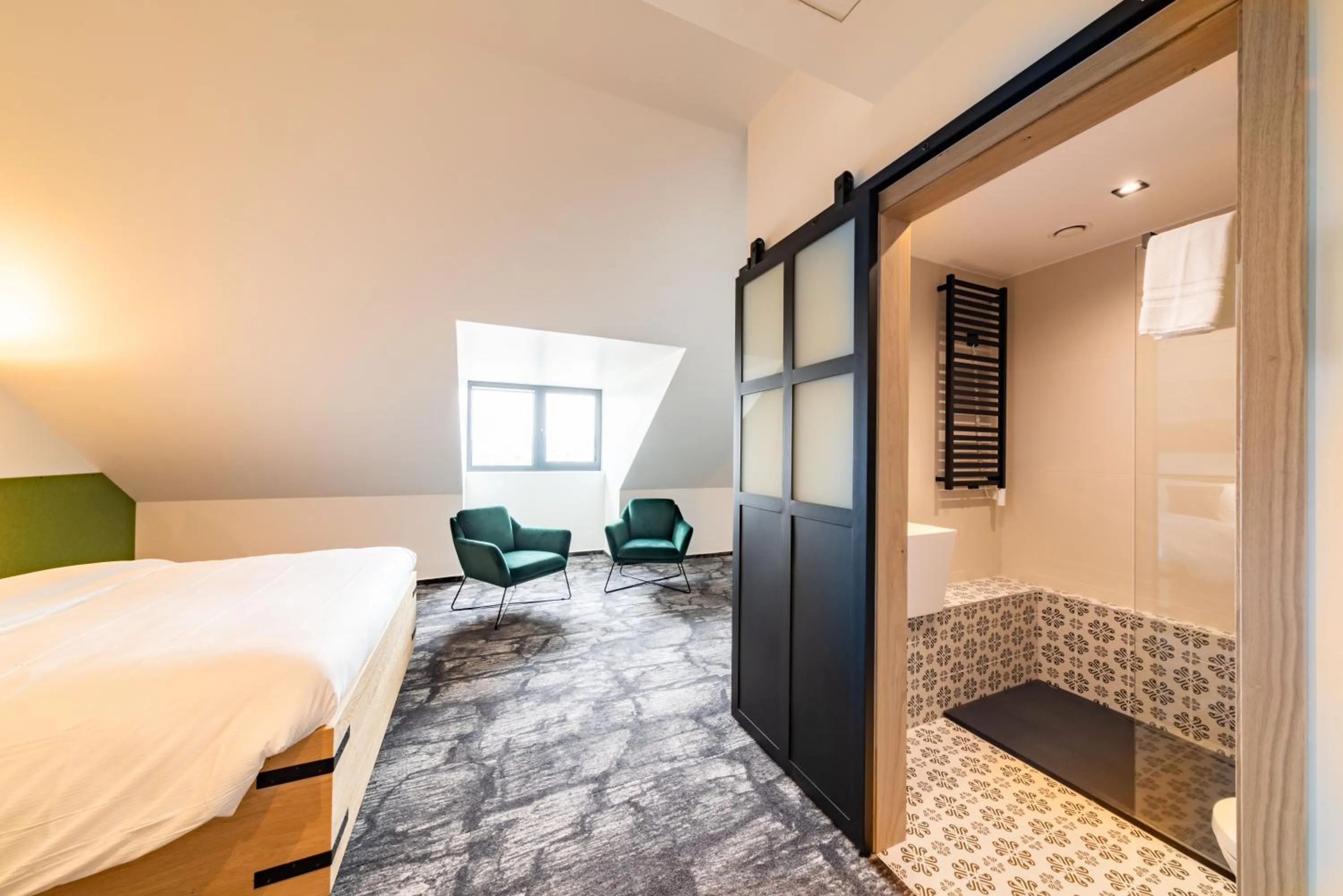 Photo of the whole room, Bed in De Brauhotel - Hôtel de la Brasserie Nationale