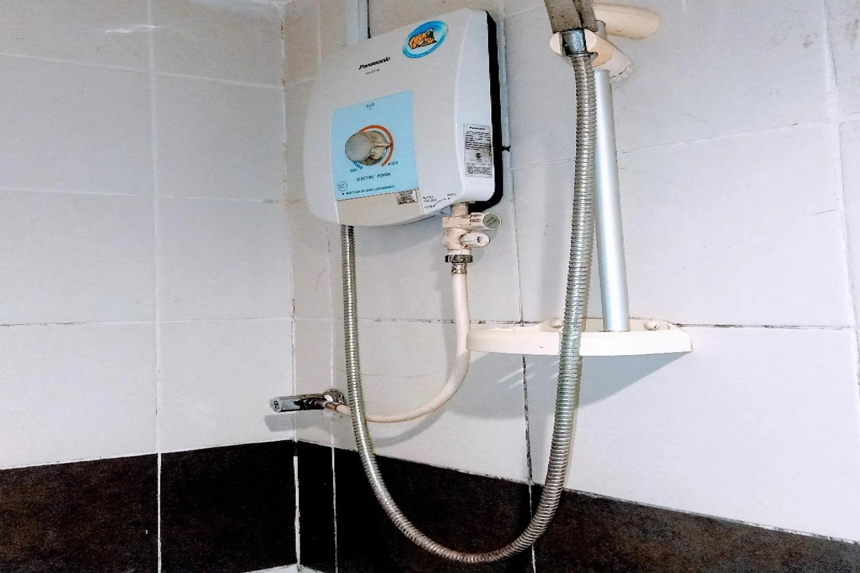 Bathroom in OYO 90411 Perdana Hotel Labuan