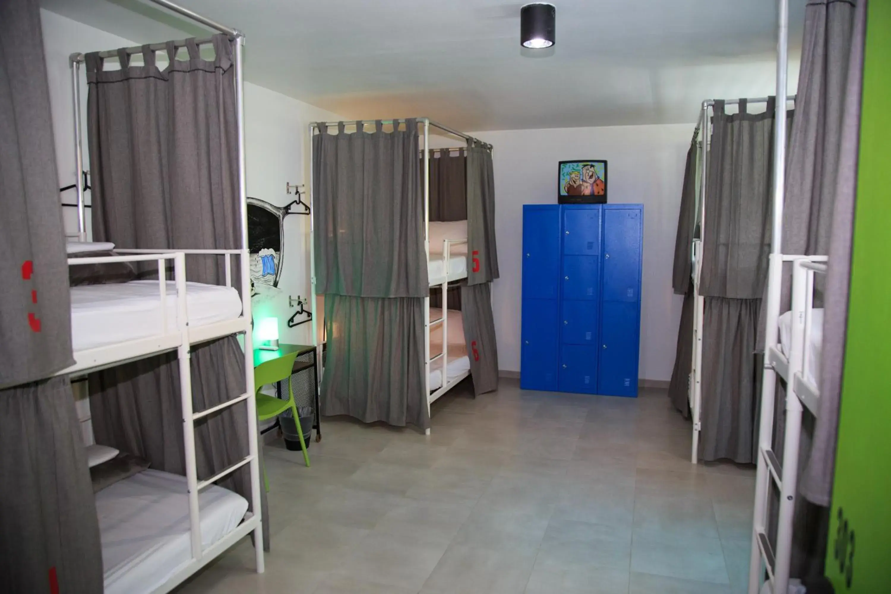 Bed in 8-Bed Mixed Dormitory Room in Nomada Beach Hostel- Isla Verde Bed in 8-Bed Mixed Dormitory Room in Nomada Beach Hostel- Isla Verde