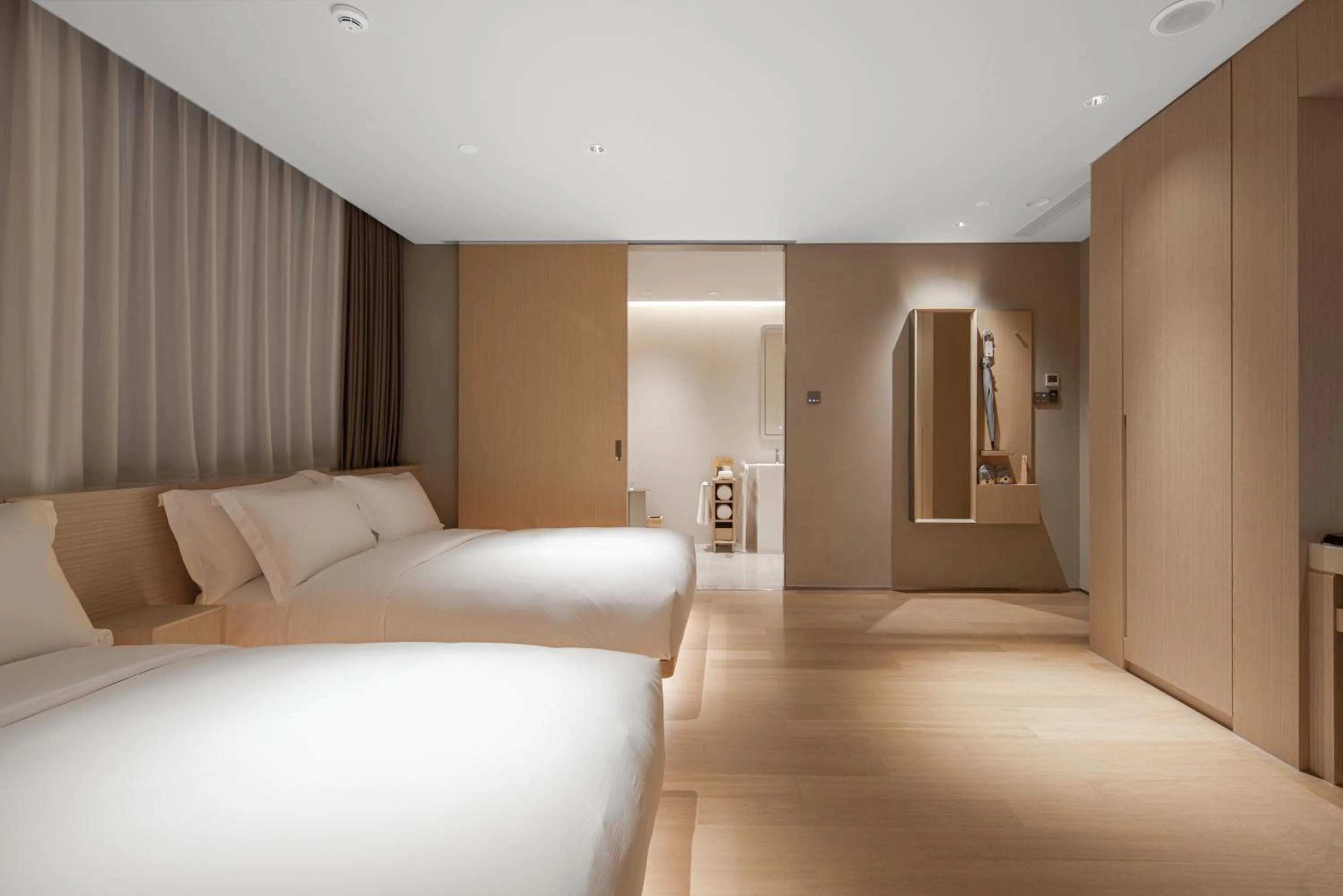 Bed in HOTEL ANDI Townscape Wuhan