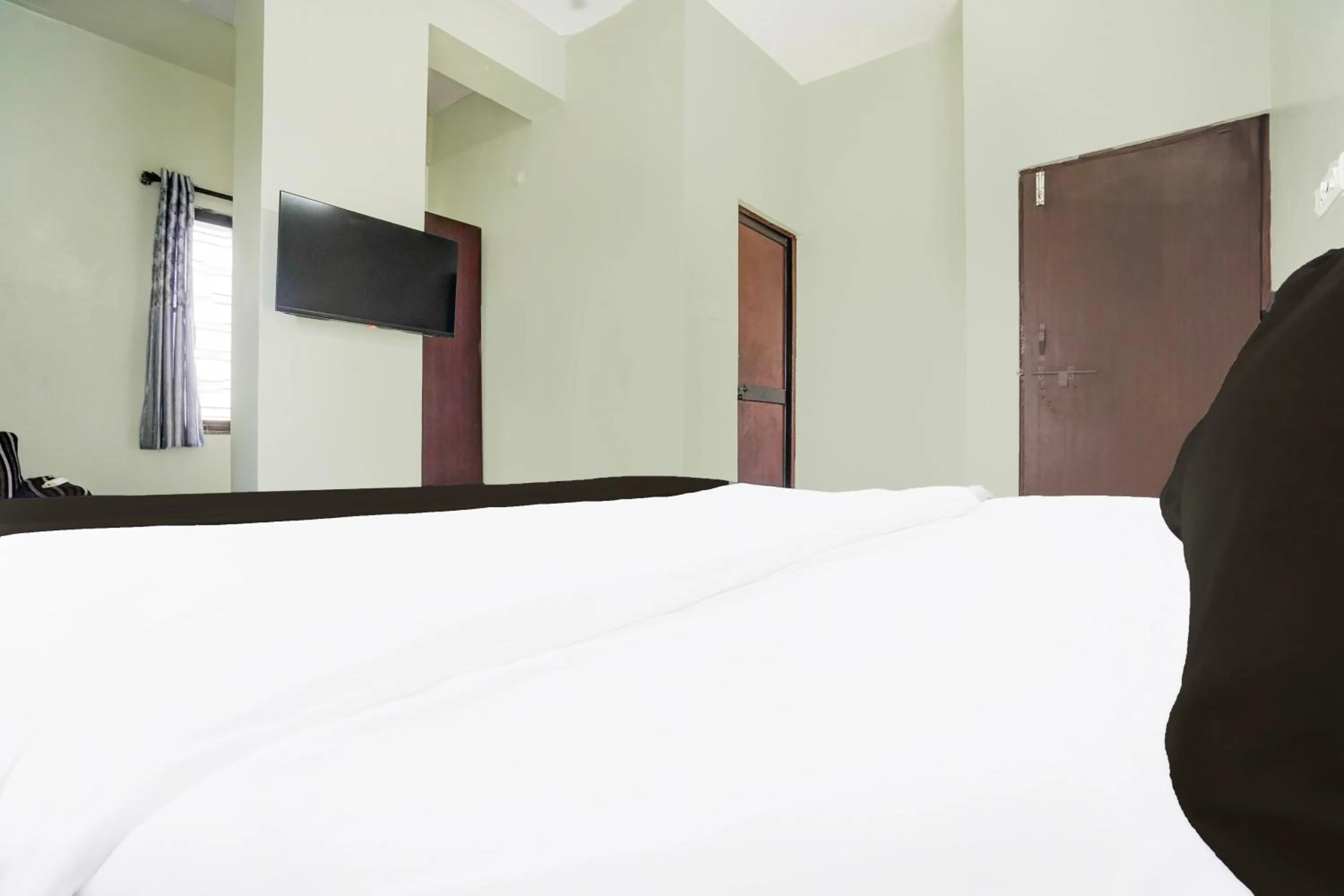 Bedroom, Bed in Super Hotel O Rajendra Nagar Hingna Road