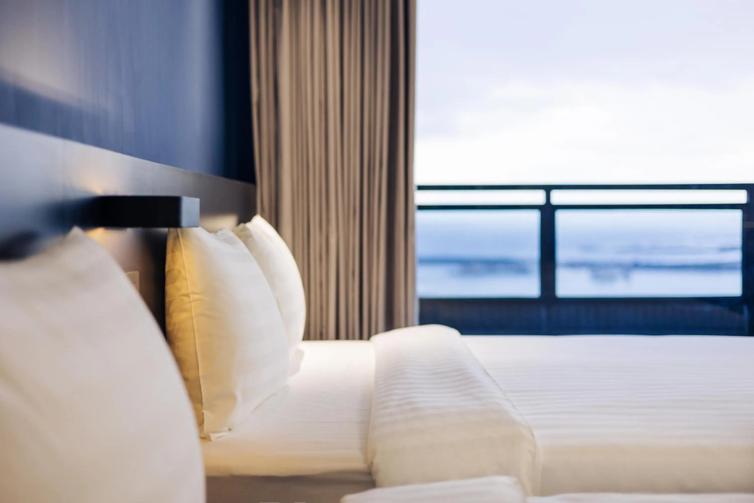 Photo of the whole room, Bed in OA HOTEL Wushih Marina