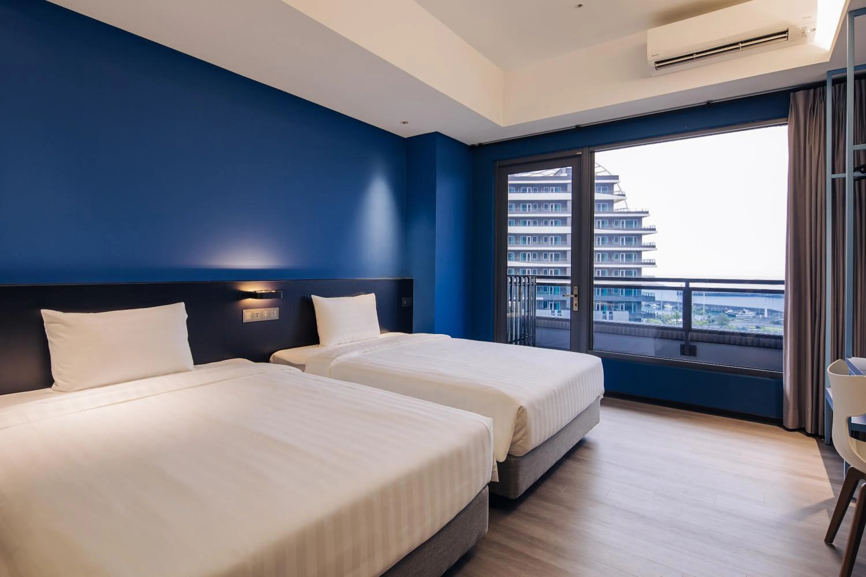 Photo of the whole room, Bed in OA HOTEL Wushih Marina