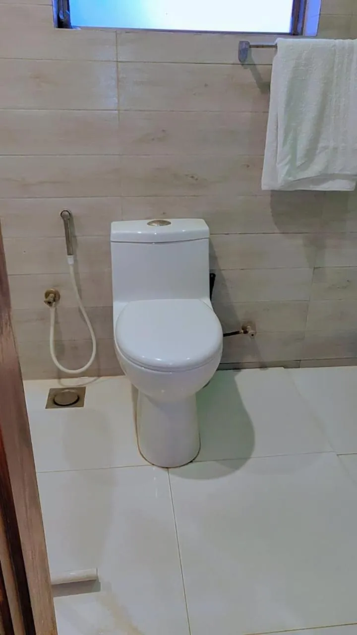 Toilet in Comfyinn Guest House