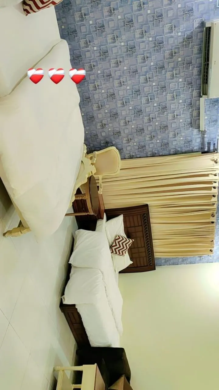 Bed in Comfyinn Guest House