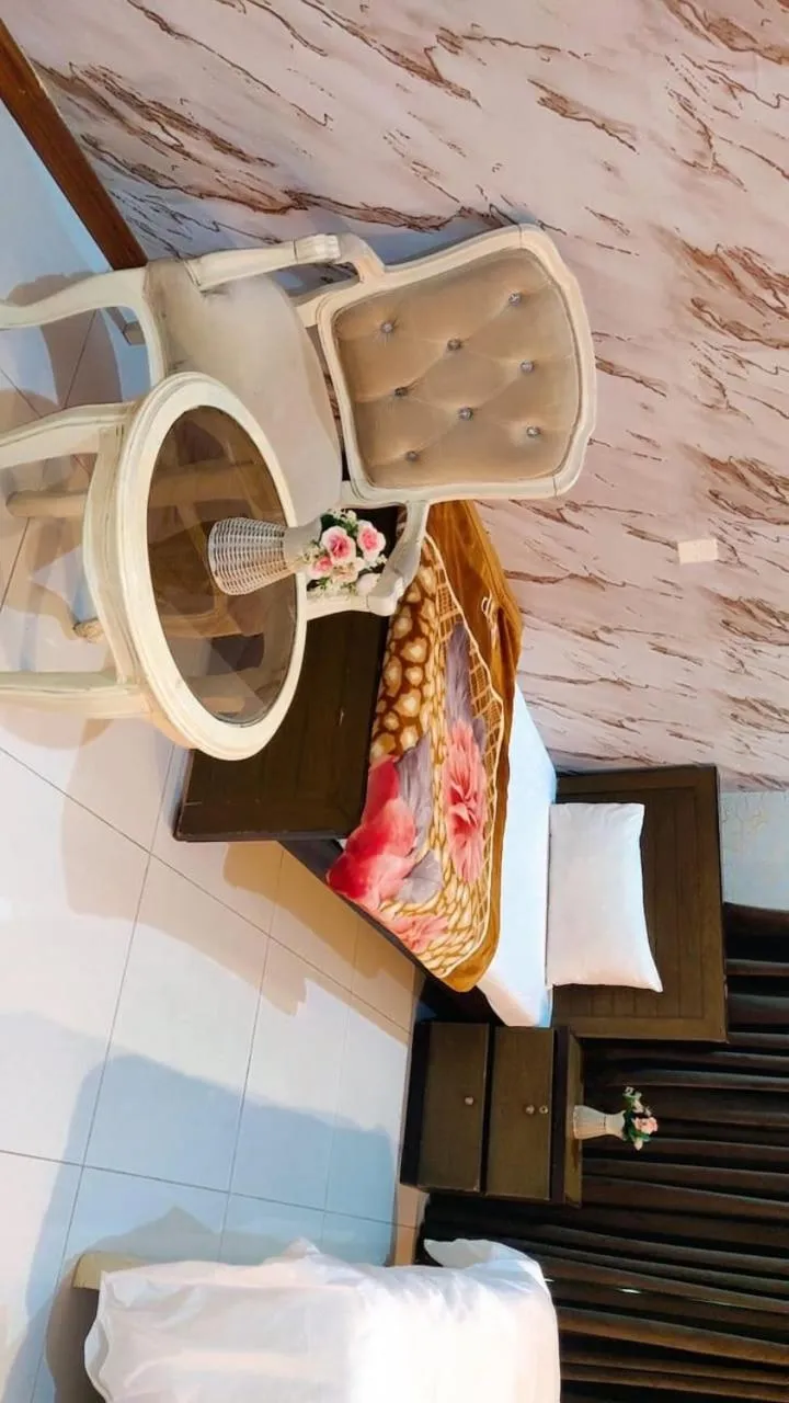 Bed in Comfyinn Guest House