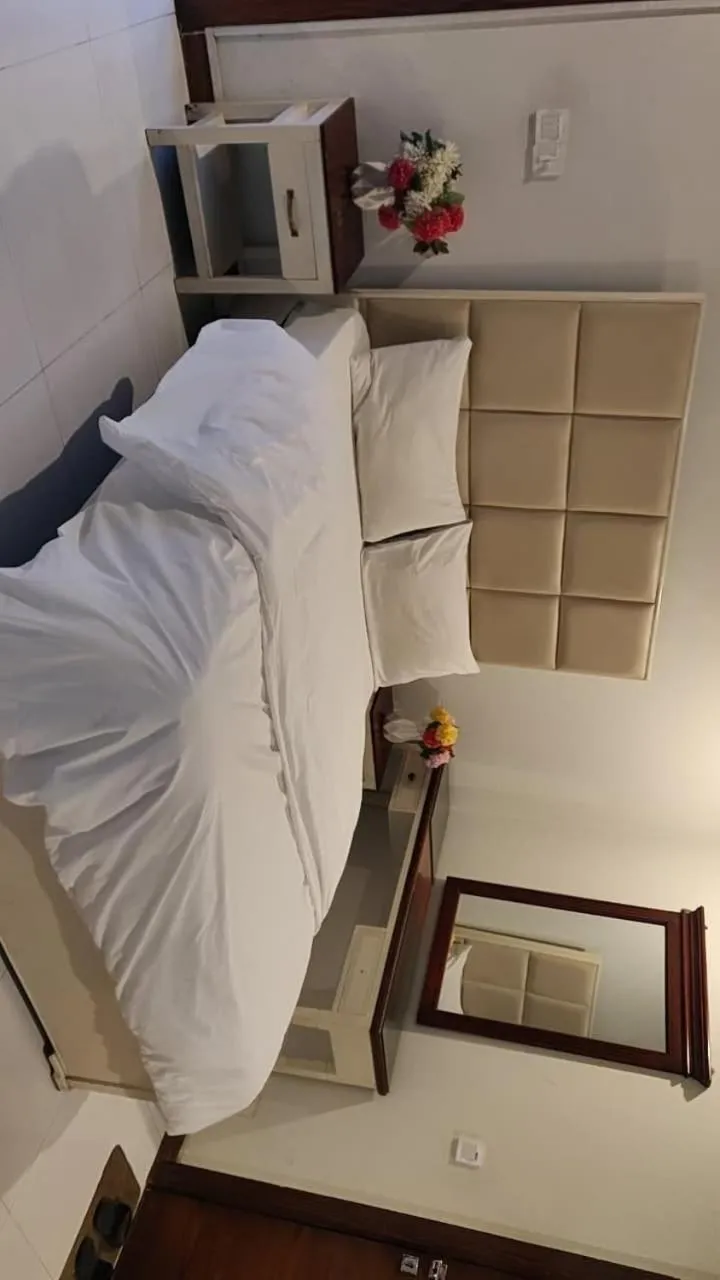 Bed in Comfyinn Guest House