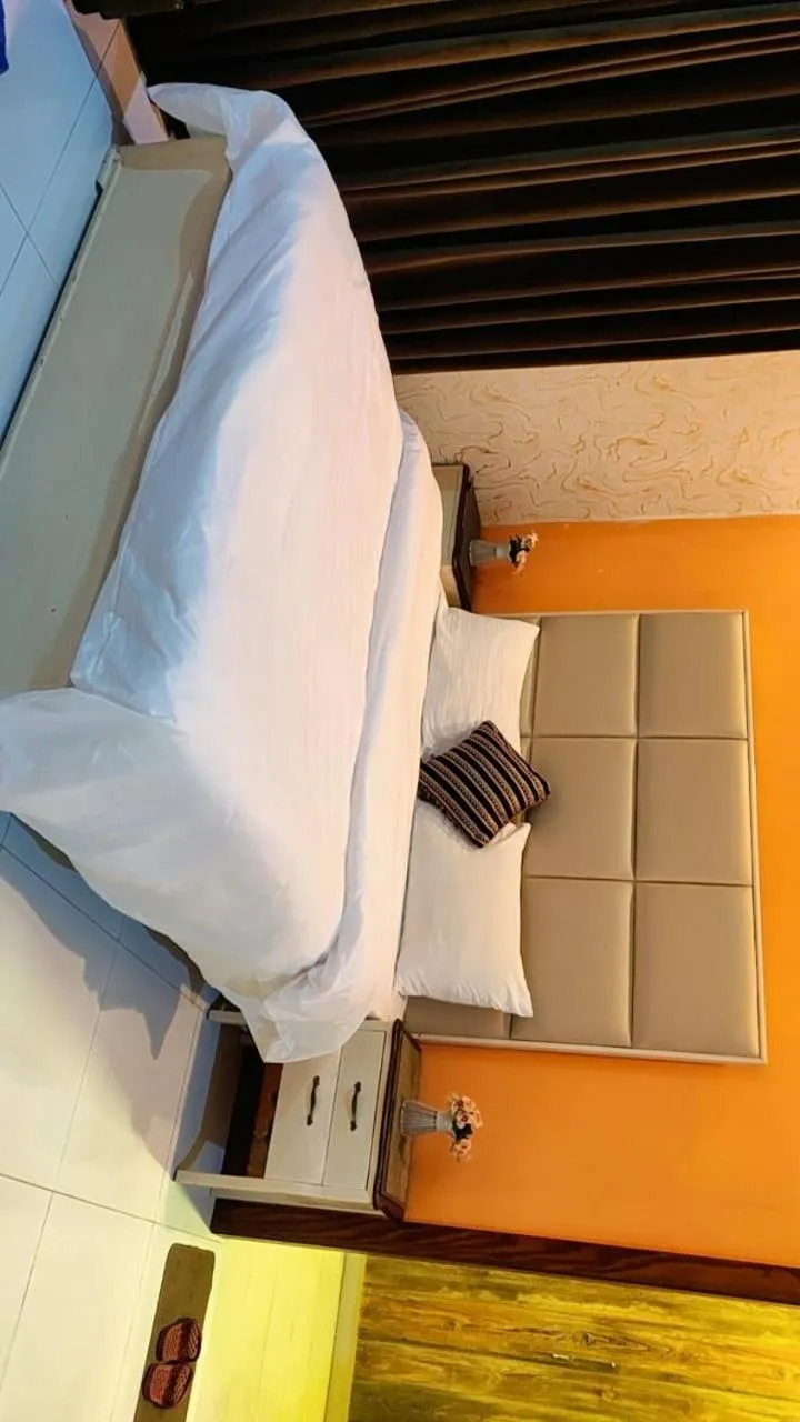 Bed in Comfyinn Guest House