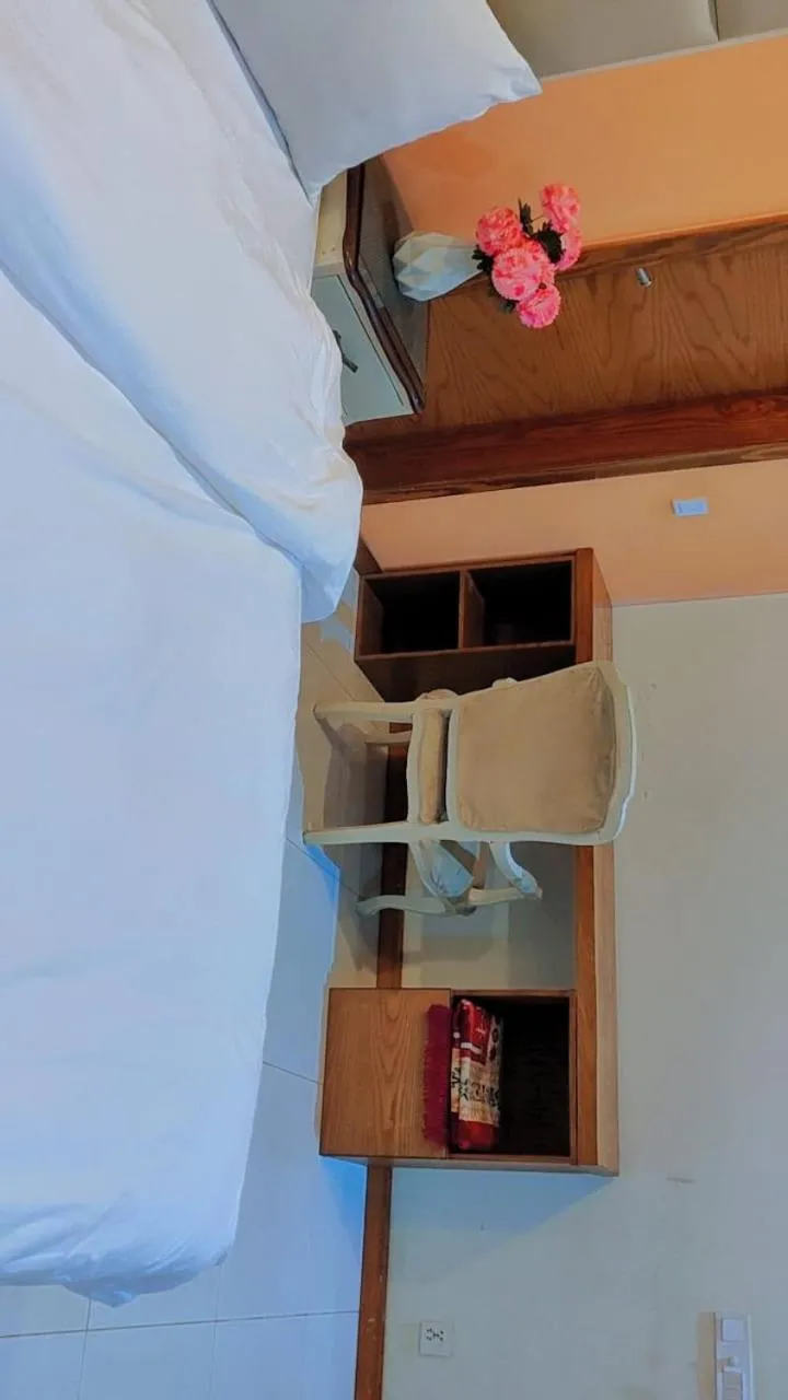 Bed in Comfyinn Guest House