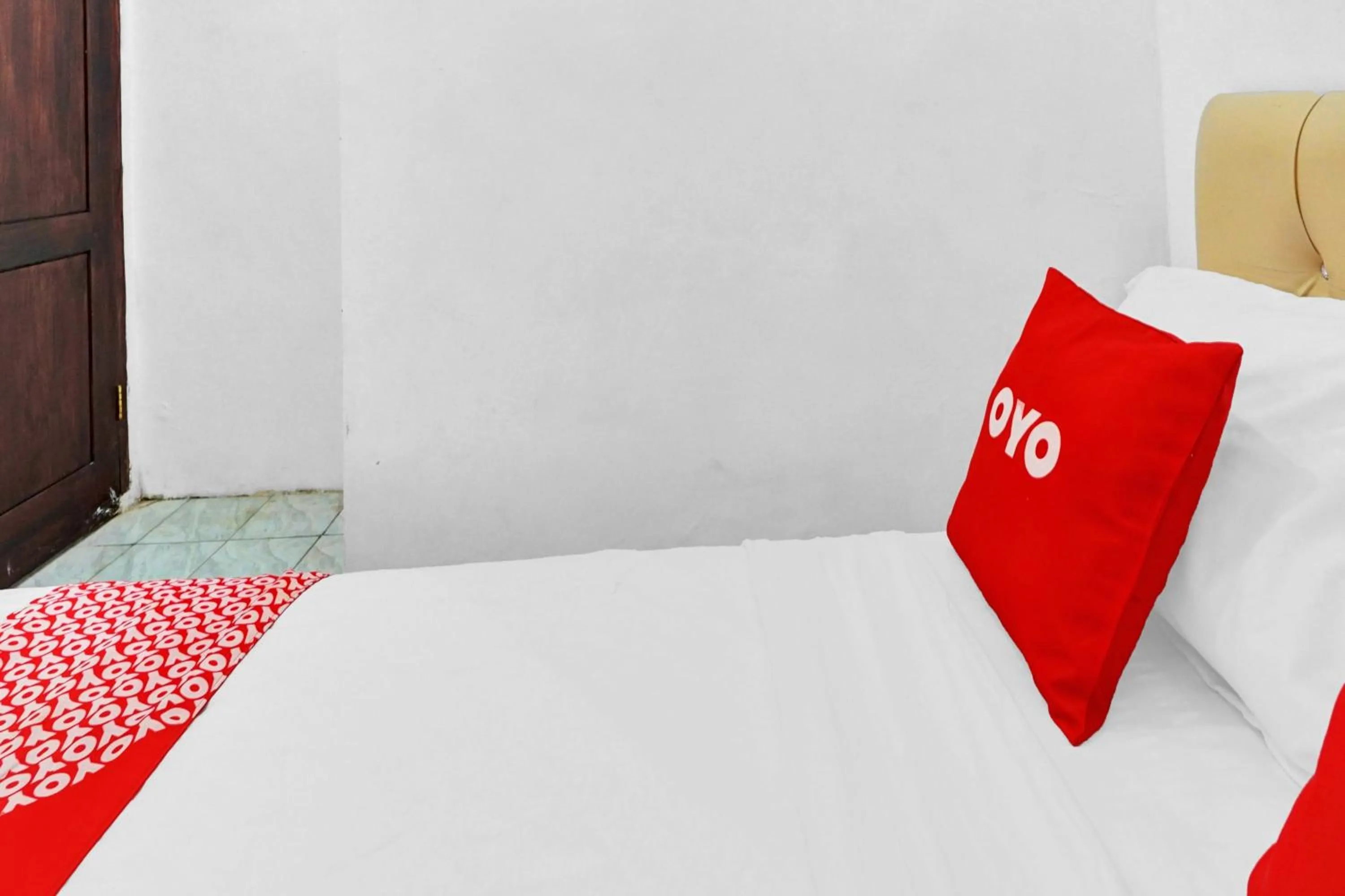 Bedroom in Hotel O Btc Guest House Syariah