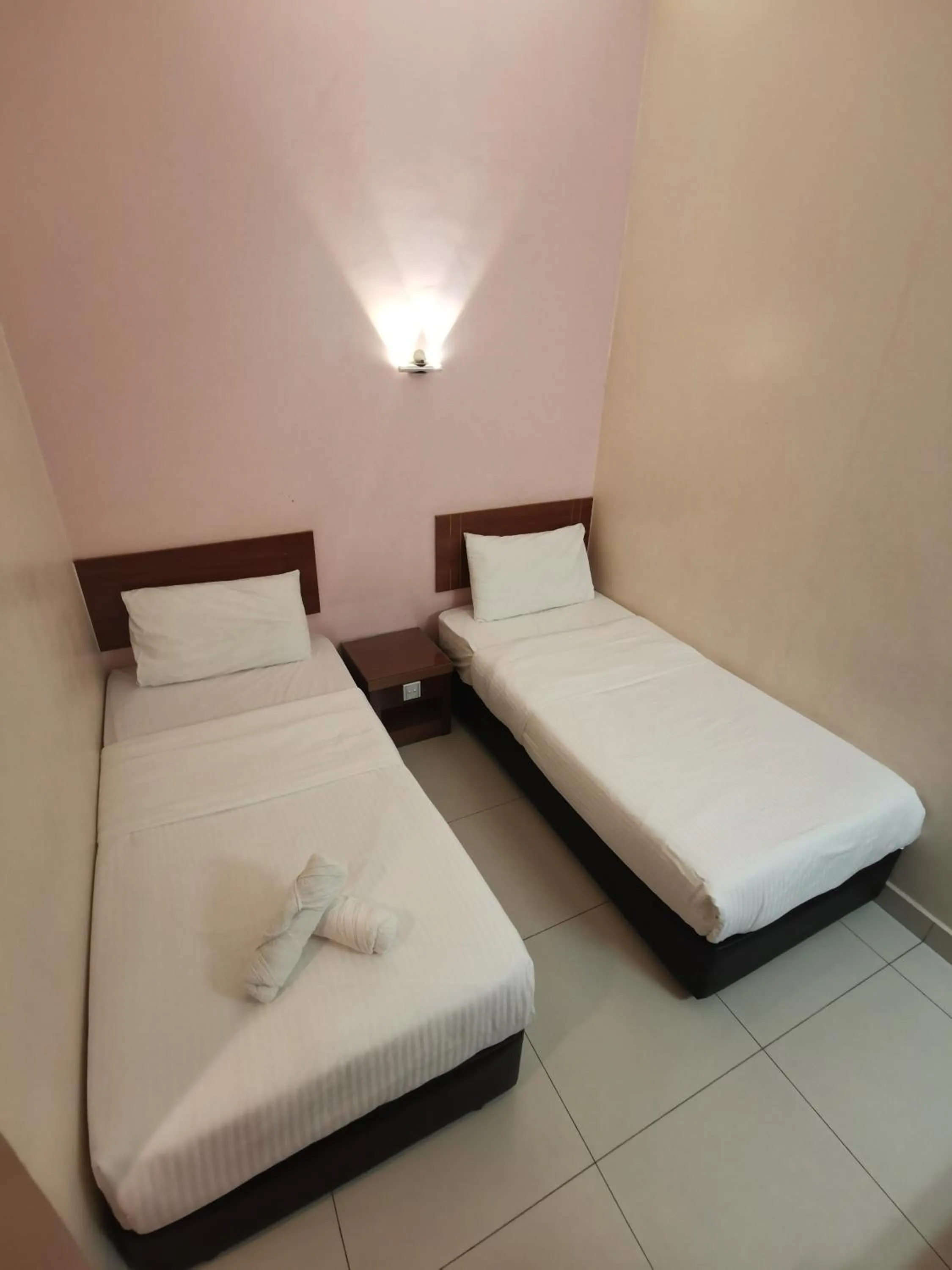 Bed in Sweet Star Hotel