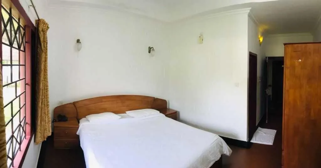 Bed in KTDC Tamarind Kondotty