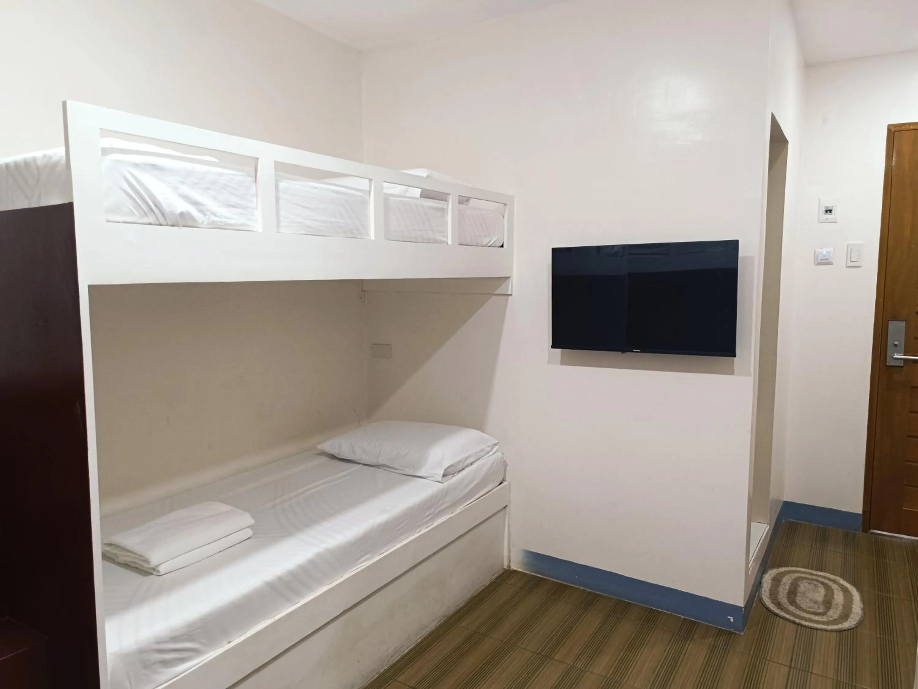 Bed in FB DORMITEL SUITES