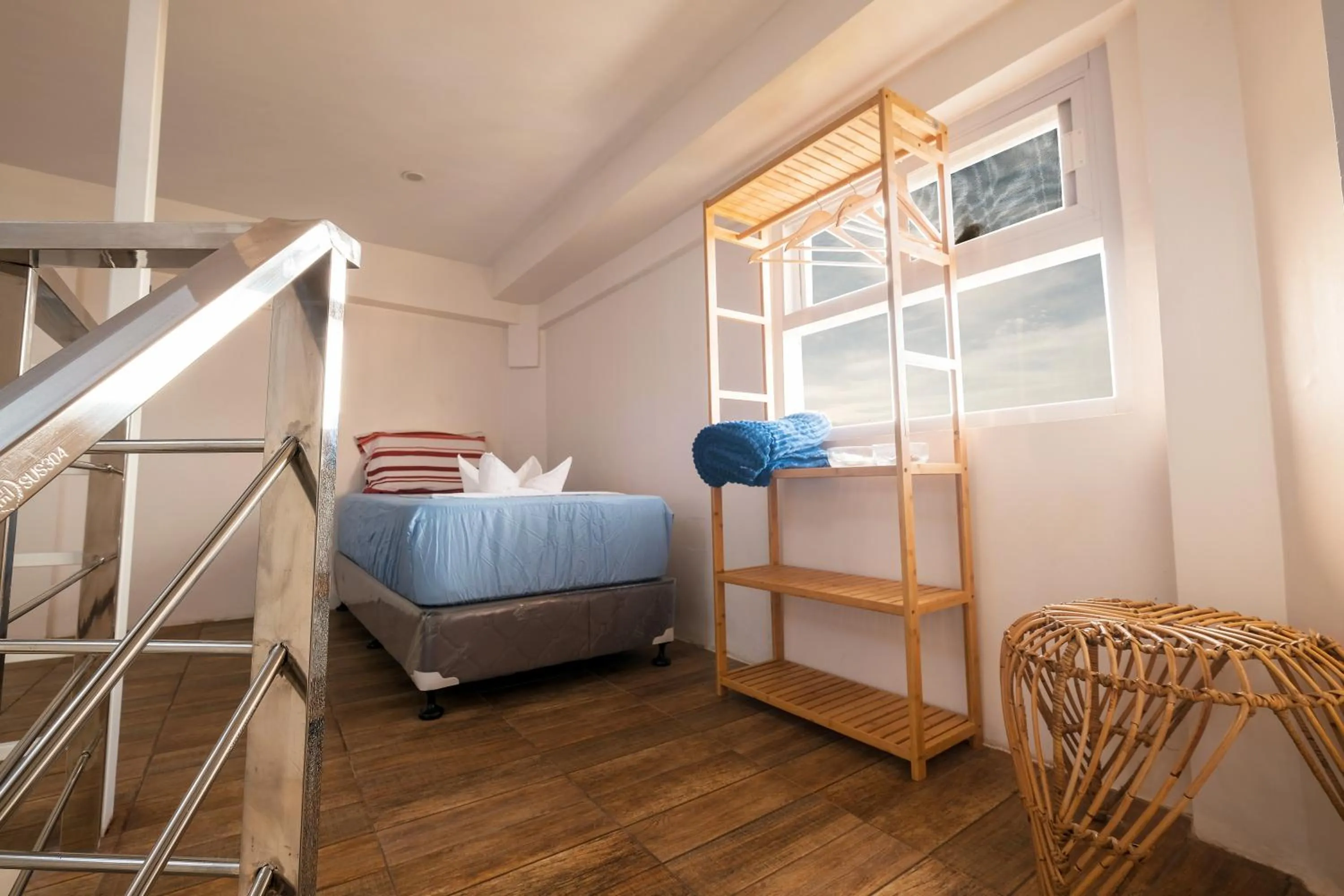 Bedroom, Bed in FB DORMITEL SUITES