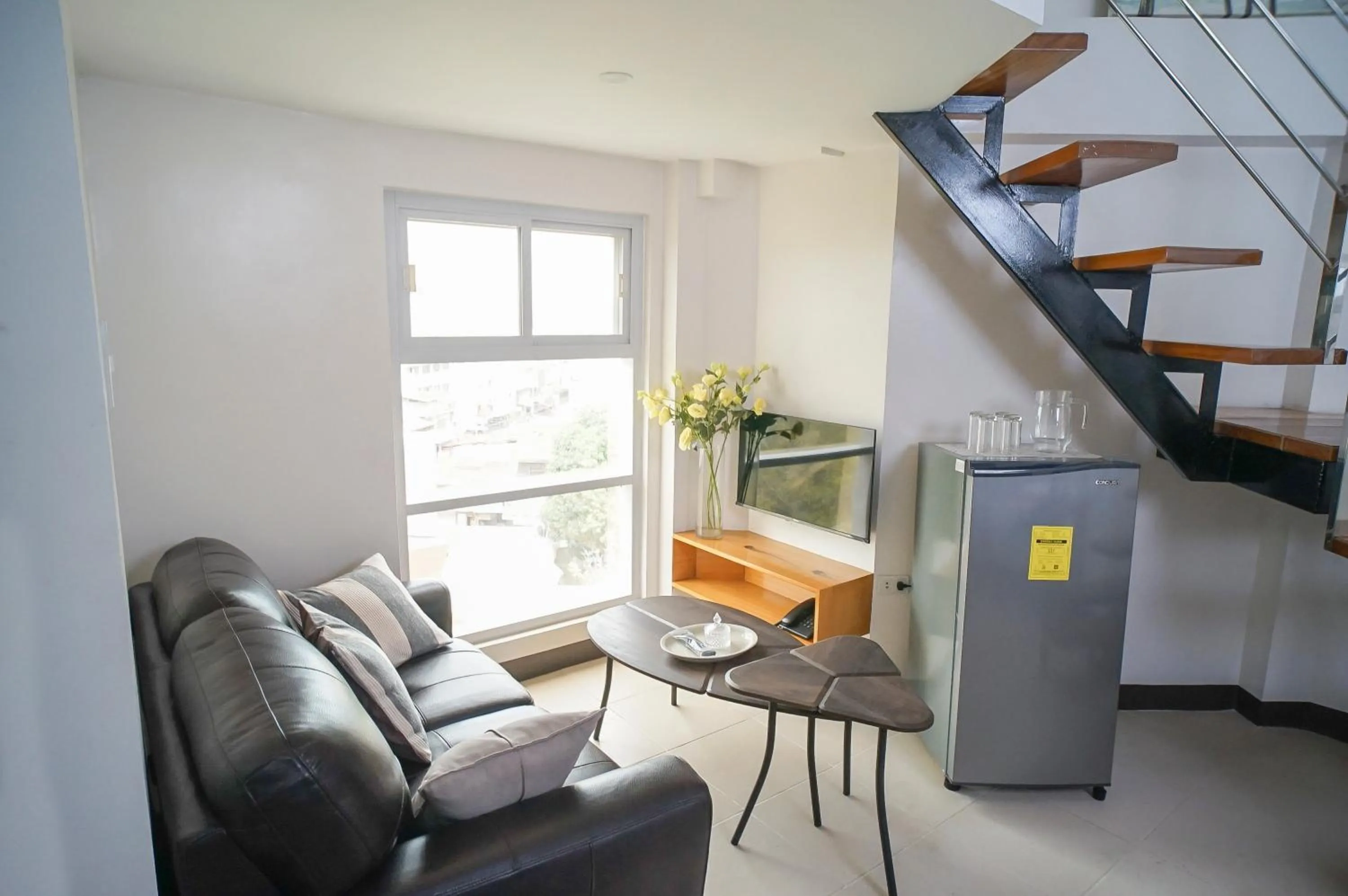 Living room in FB DORMITEL SUITES