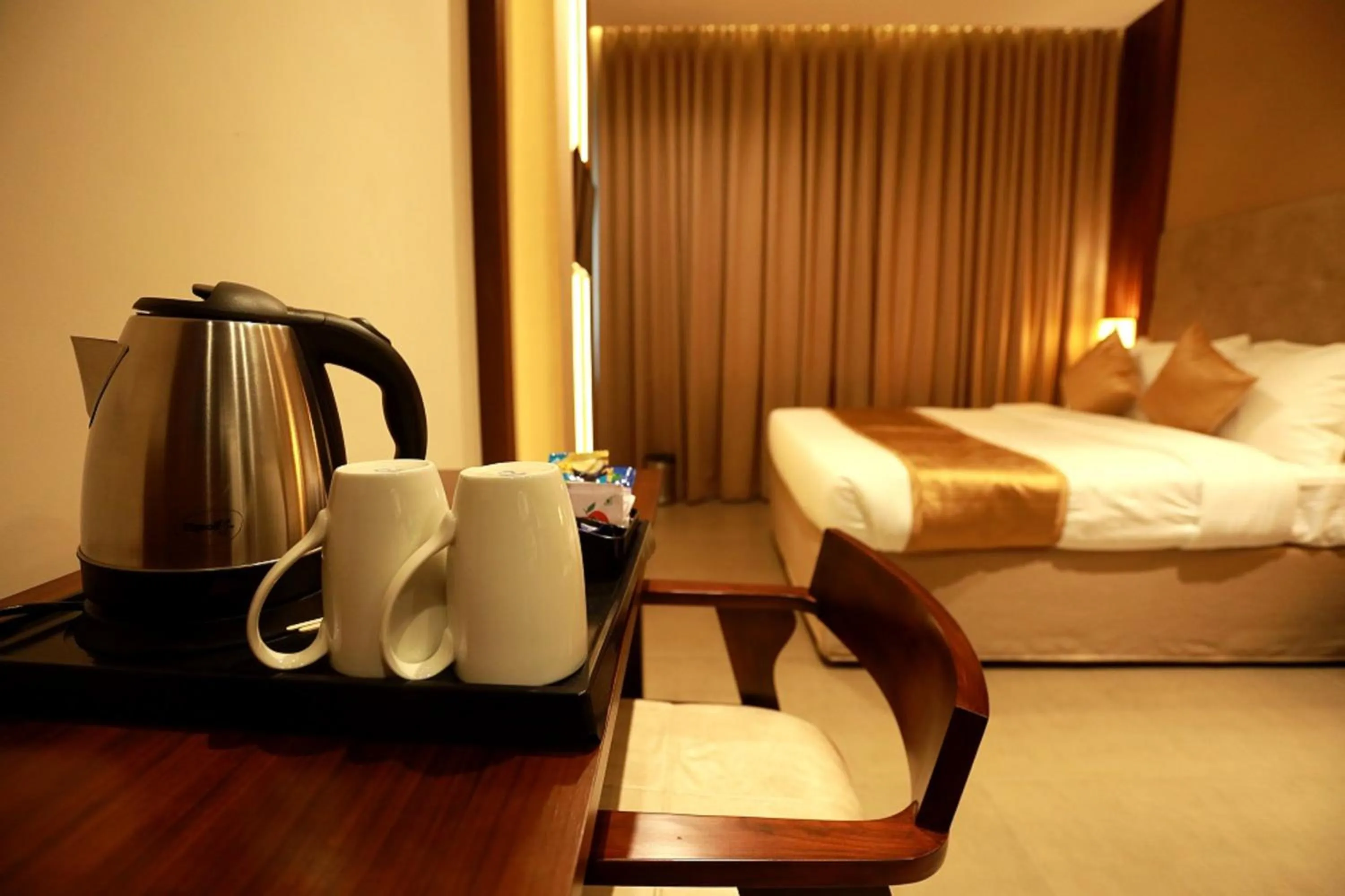 Coffee/tea facilities, Bed in Magnet Hotel