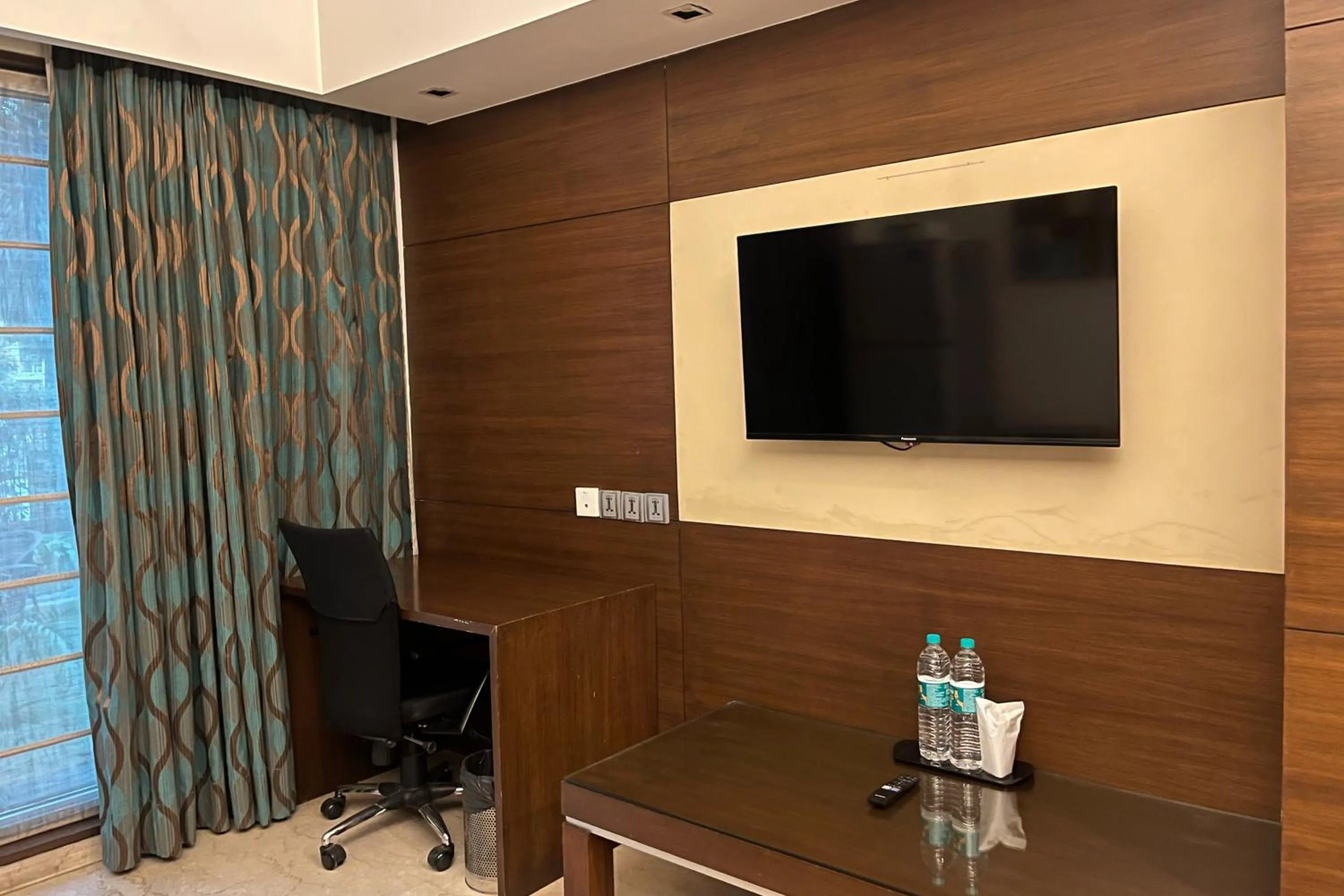 TV and multimedia in YUHI MANSIONS-A Boutique Hotel