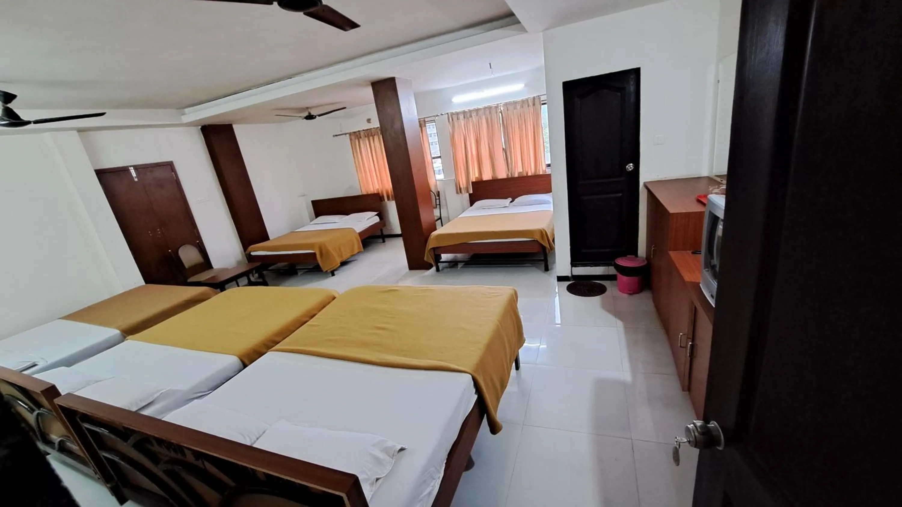 Bed in Hotel Dhruv Palace