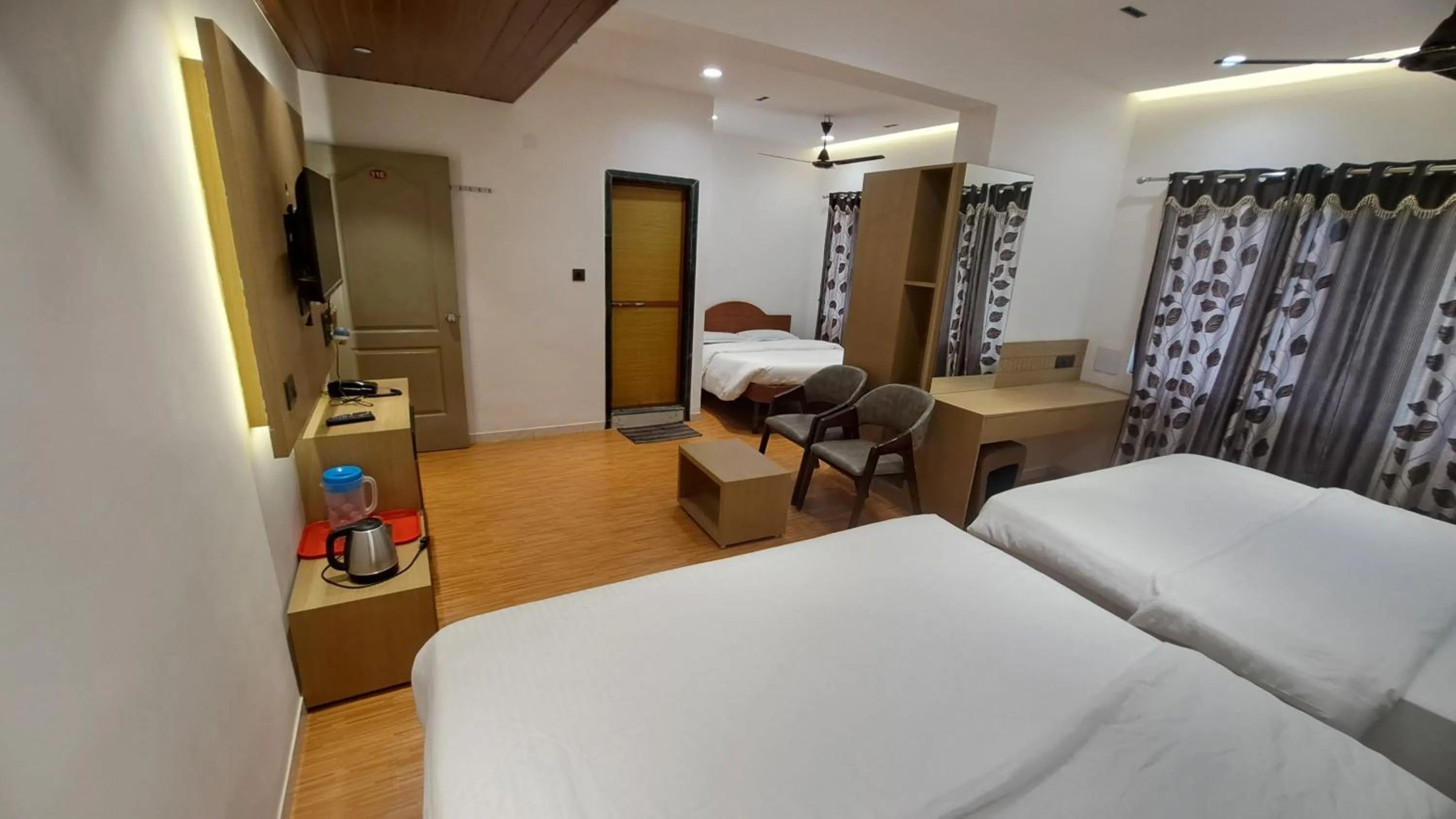 Bed in Hotel Dhruv Palace