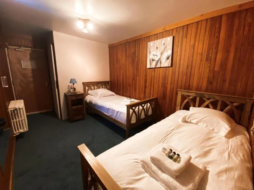 Bed in La Petite Auberge