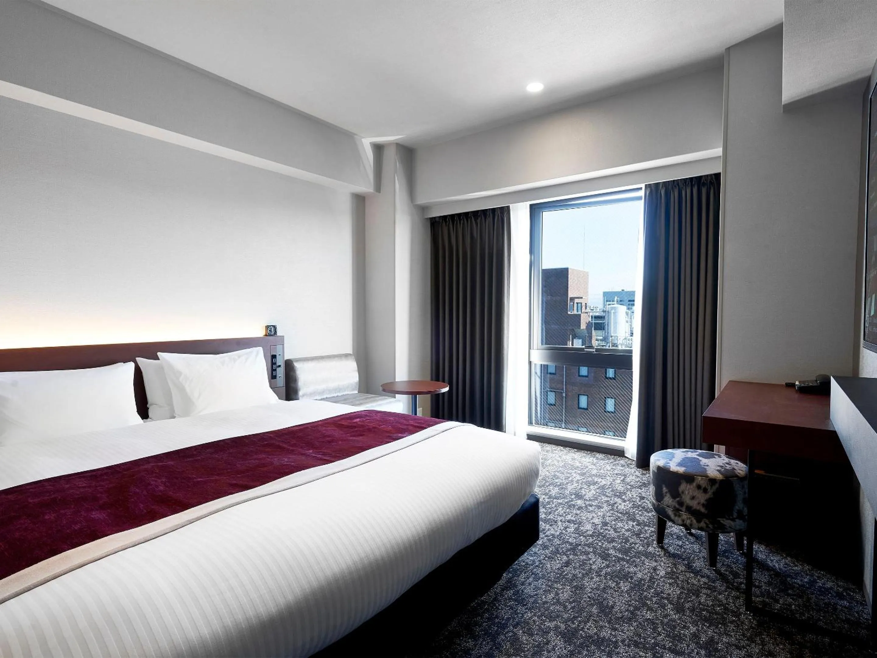 Bed in Daiwa Roynet Hotel Kumamoto Ginzadori PREMIER - former Daiwa Roynet Hotel Kumamoto Ginzadori