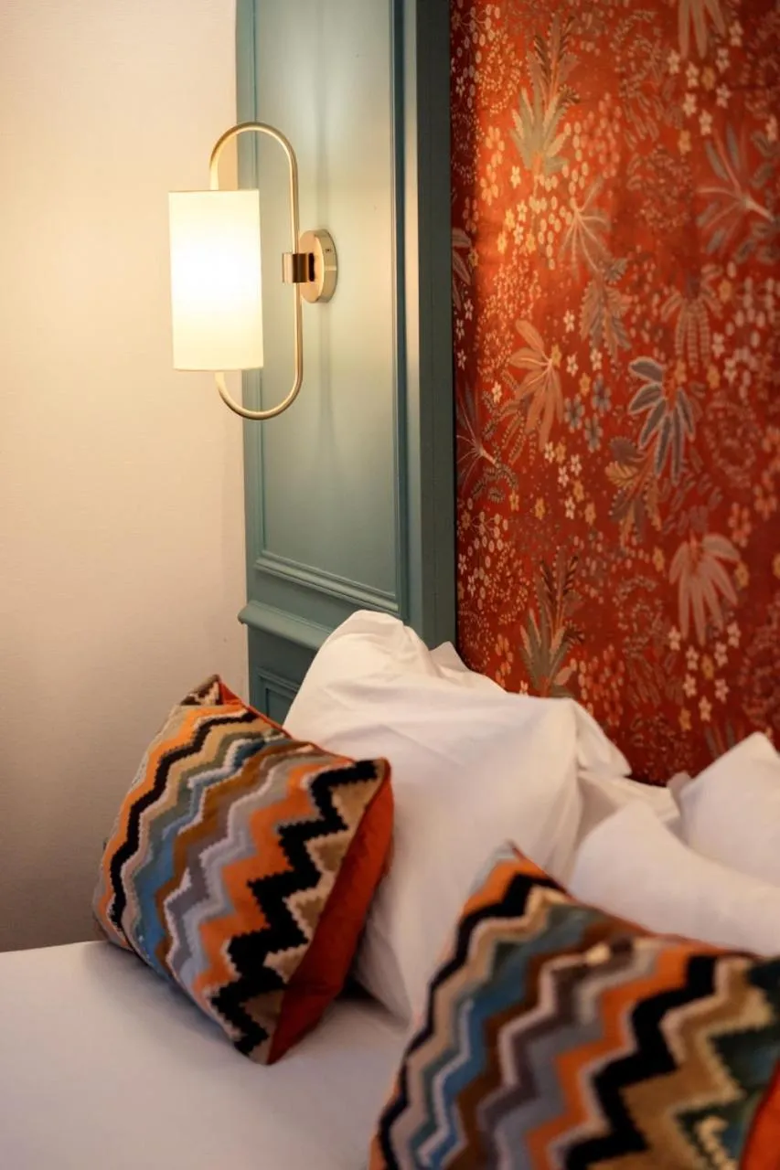 Bed in Hotel de Fleurie - Saint-Germain-des-Pres