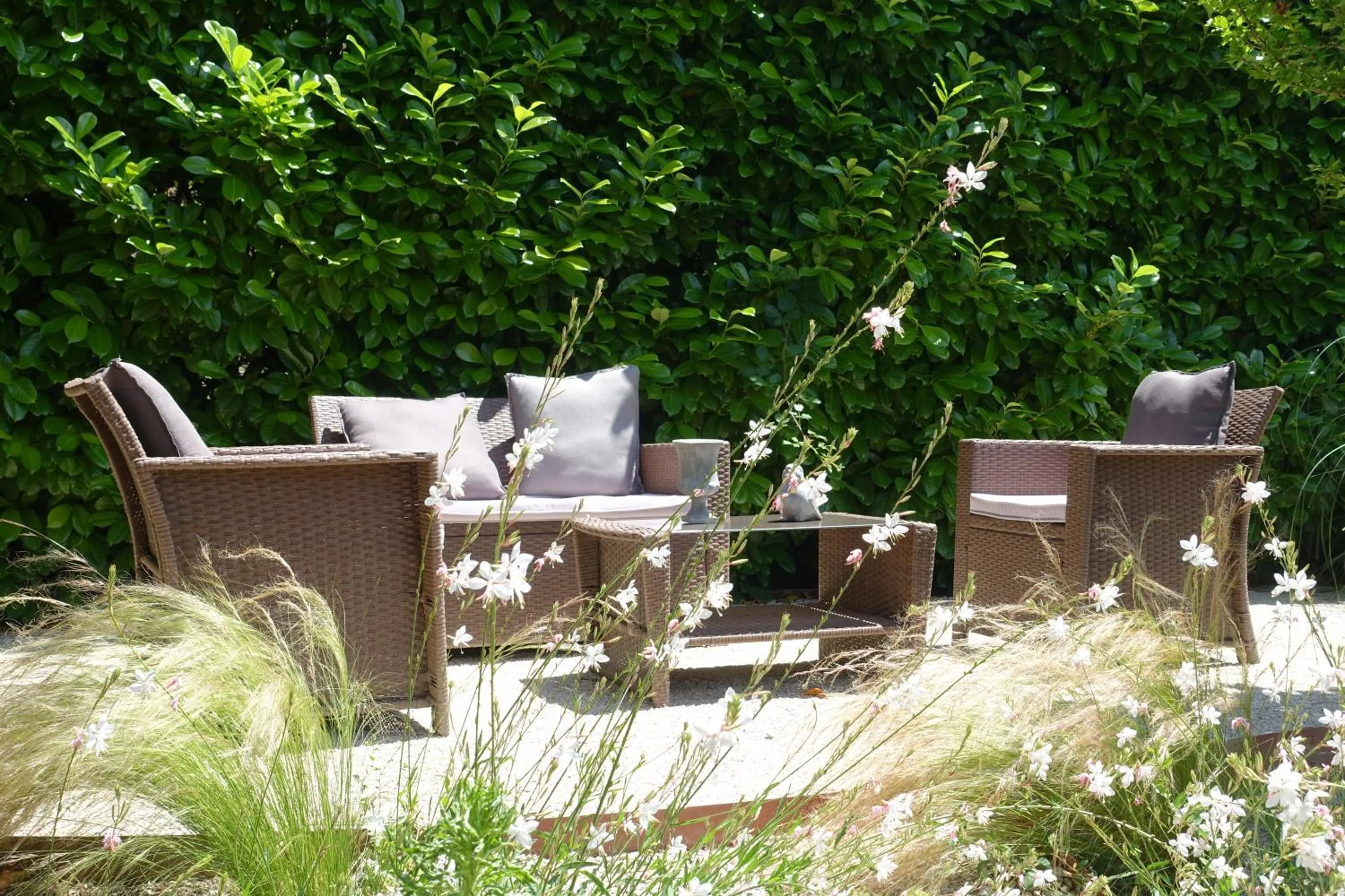 Garden in Hôtel l'Amandière