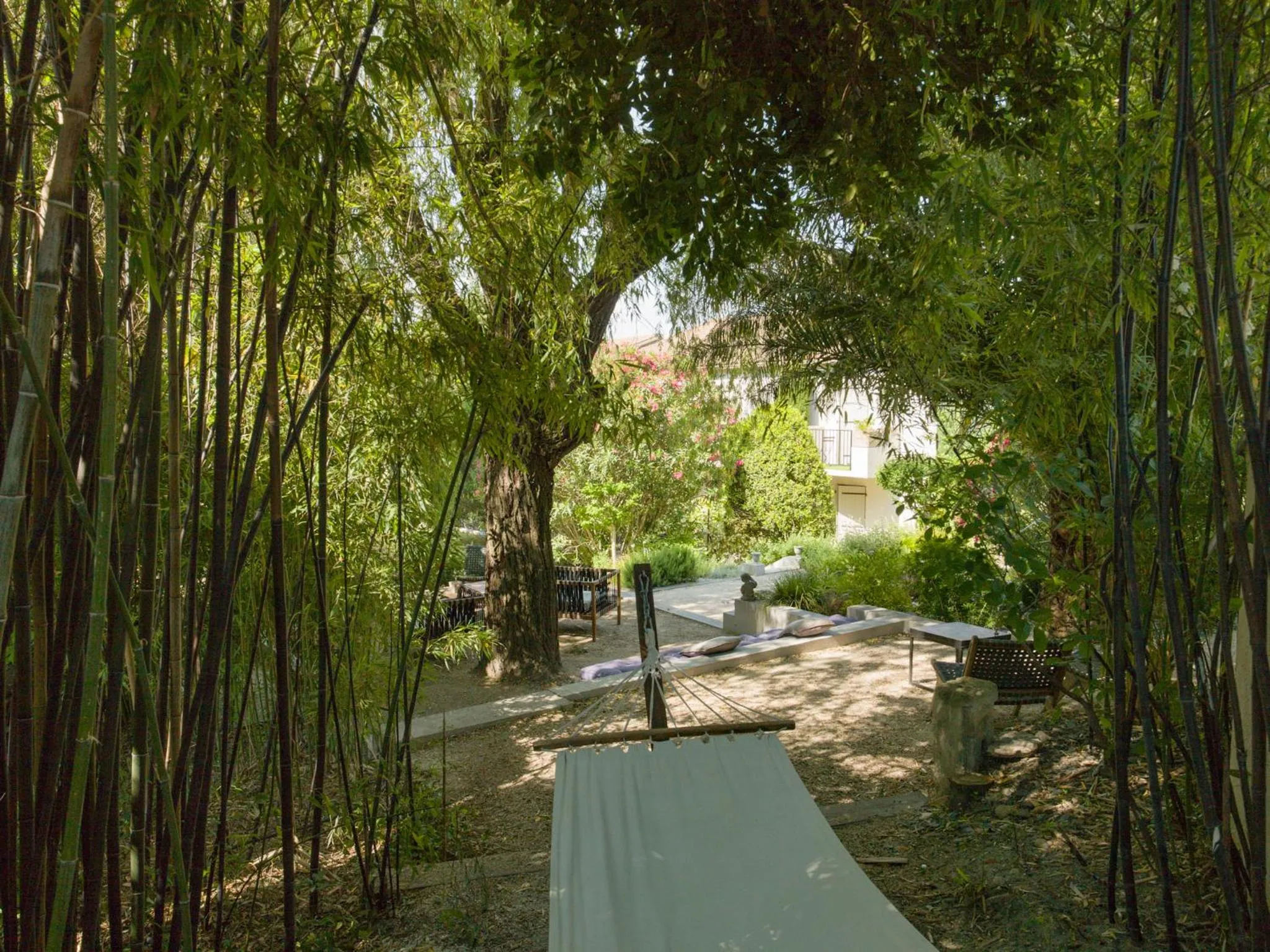 Garden in Hôtel l'Amandière