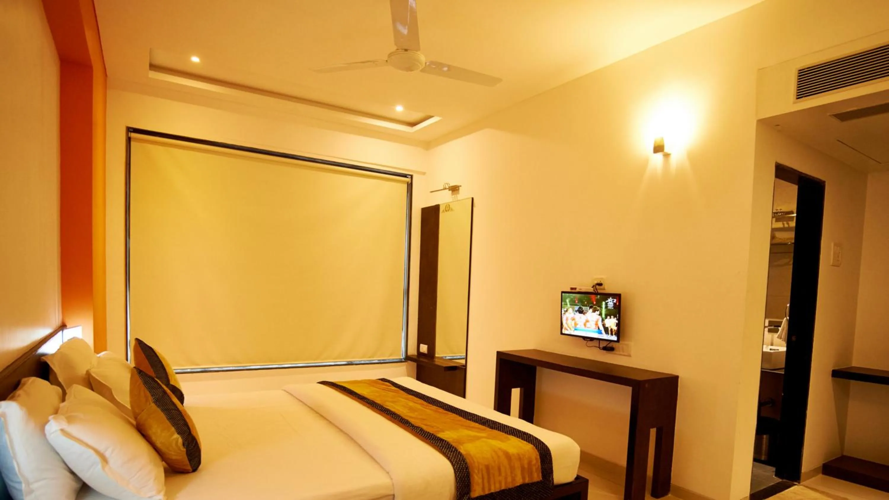 Bed in HOTEL SAI NISARG