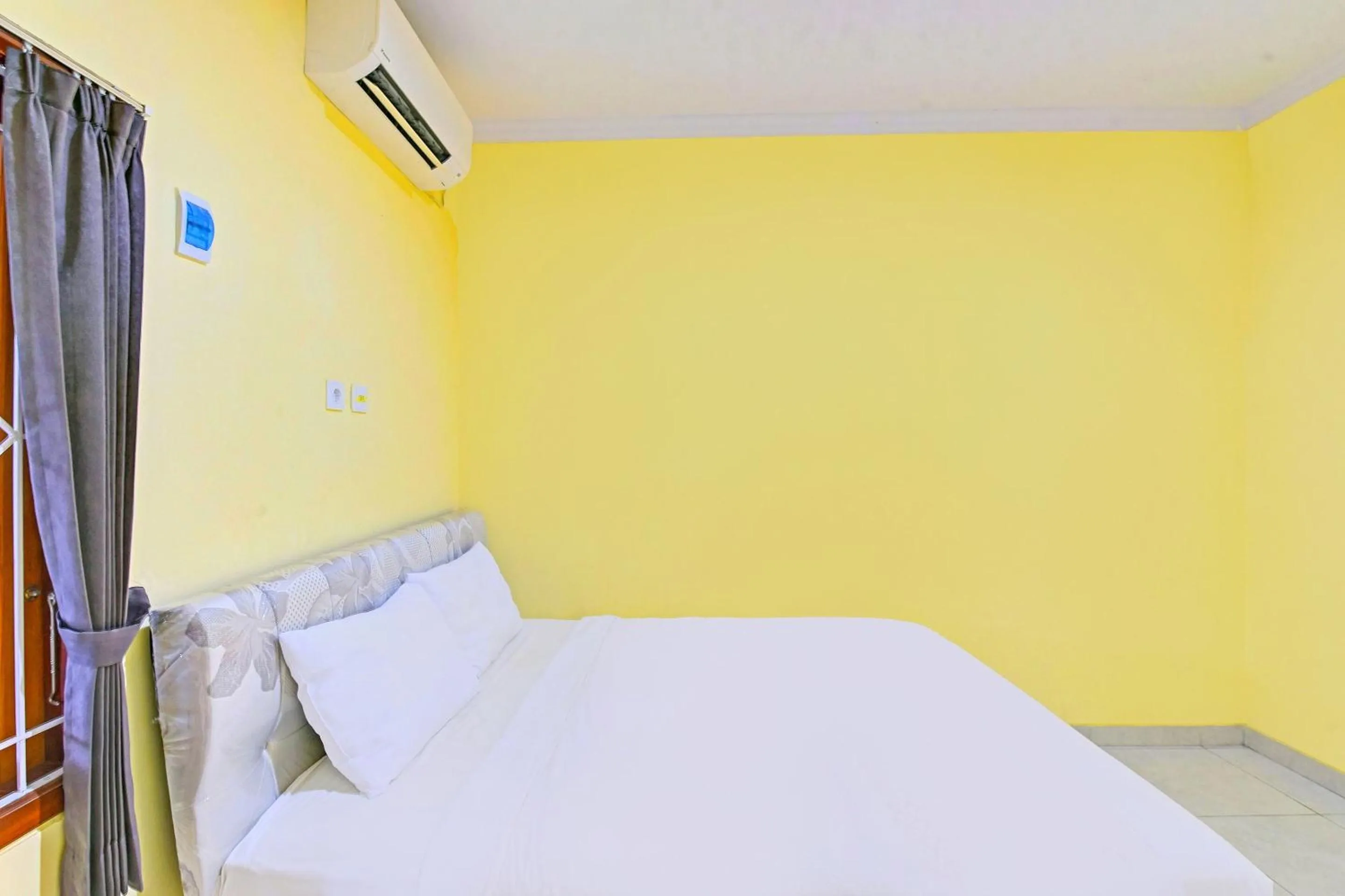 Bedroom in Hotel O Casa Jupiter Shine