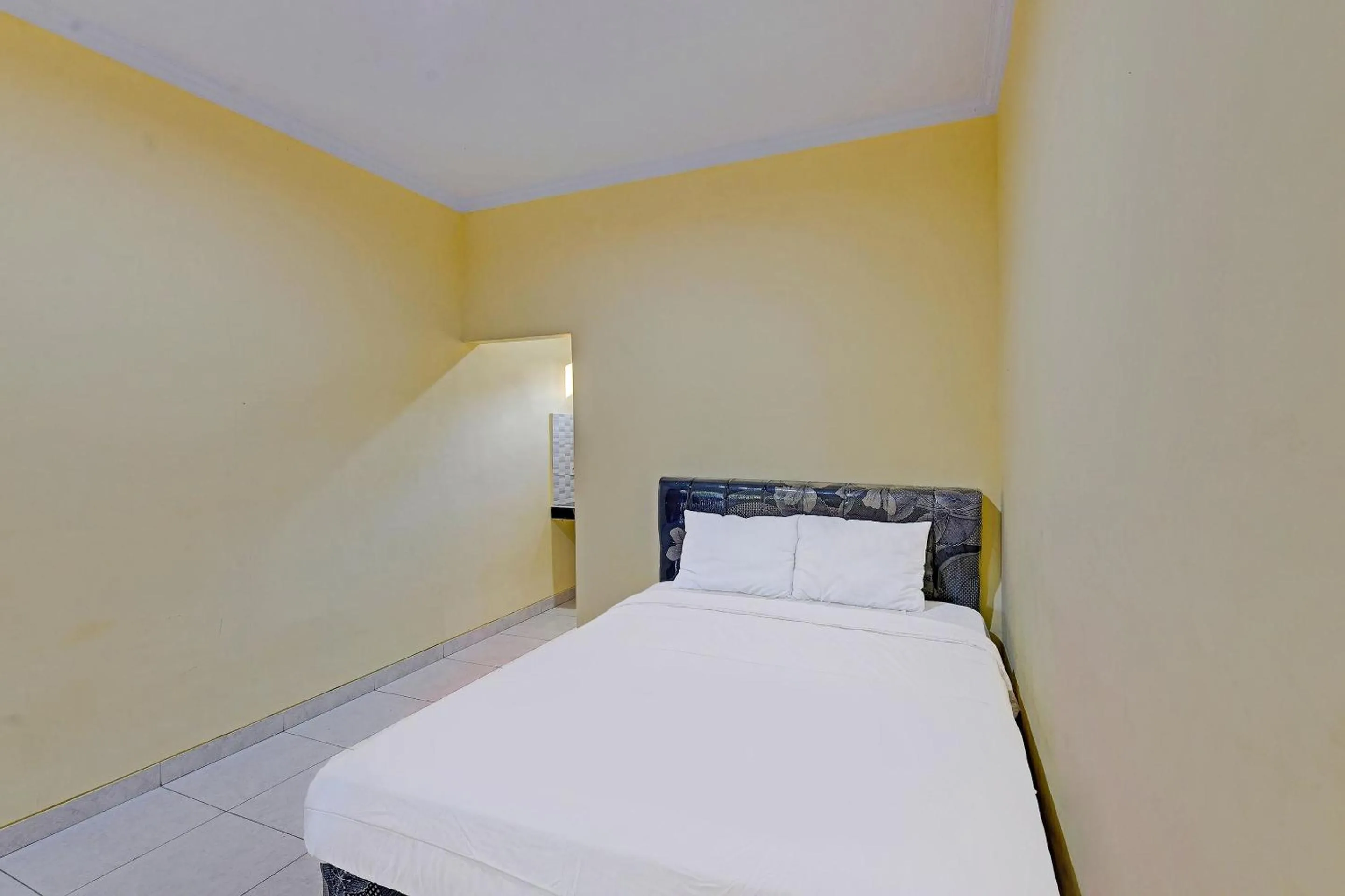 Bedroom in Hotel O Casa Jupiter Shine