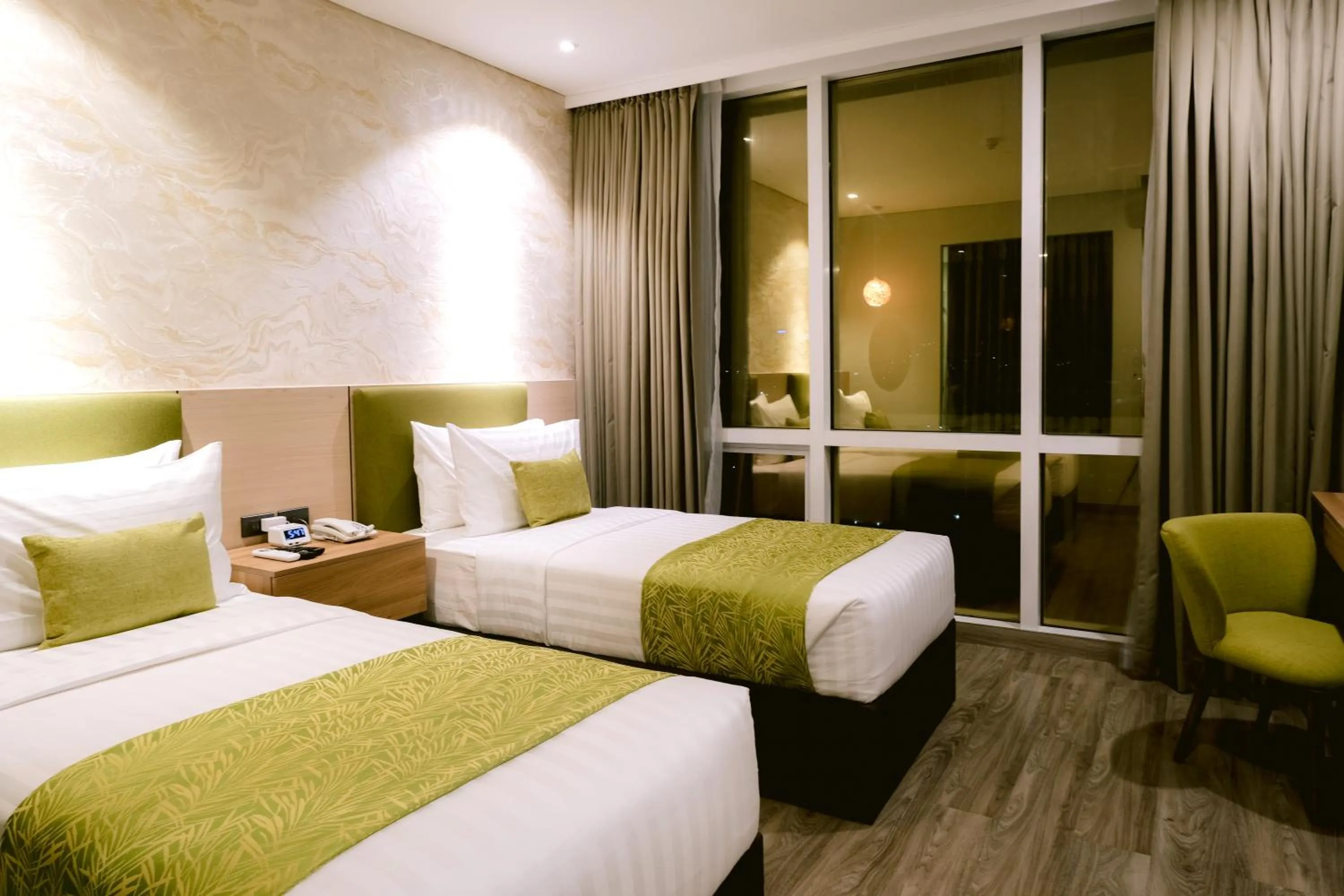 Bed in Goldberry Suites and Hotel Cebu